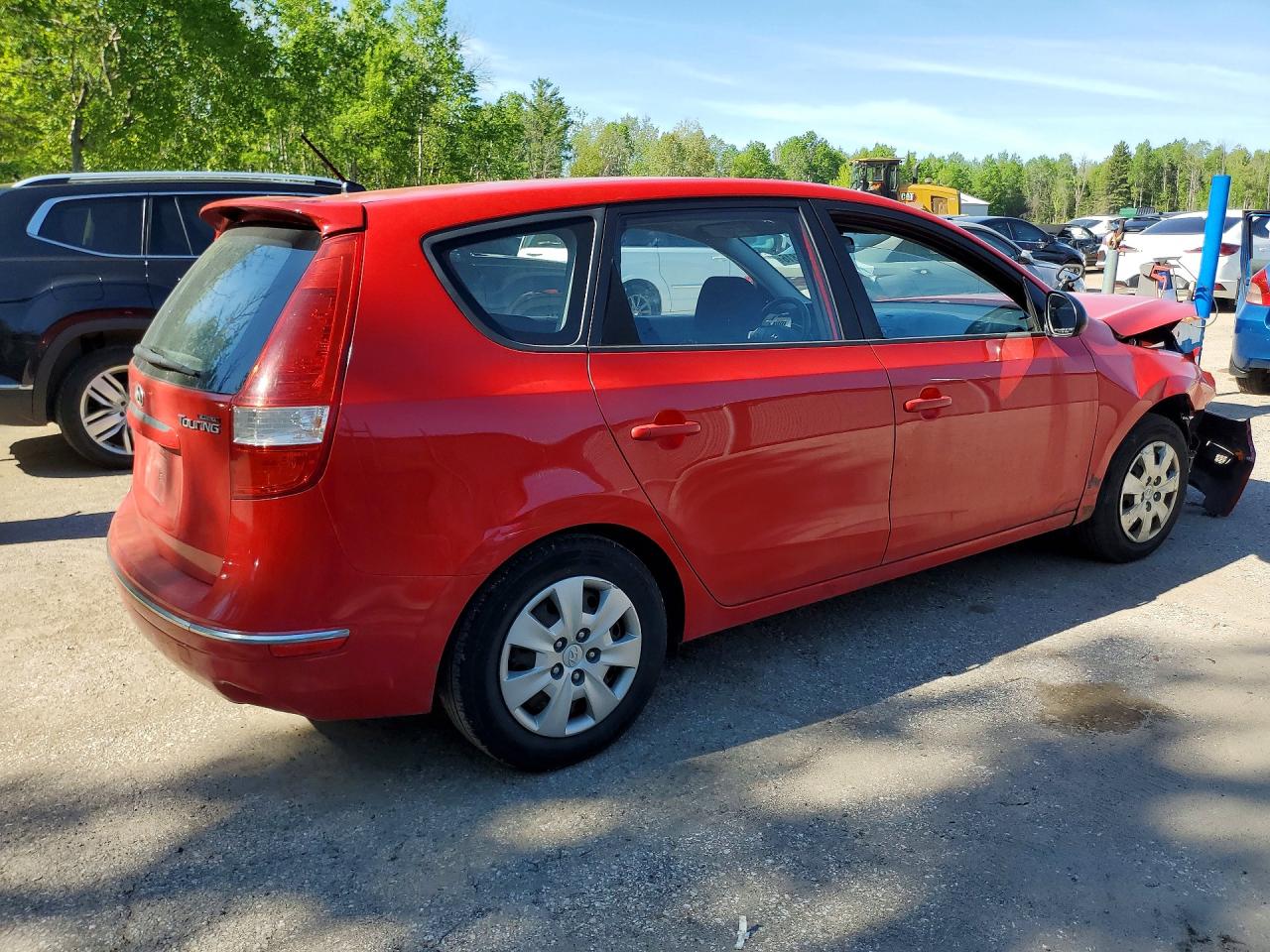 2009 Hyundai Elantra Touring Red vin: KMHDB85E09U036481