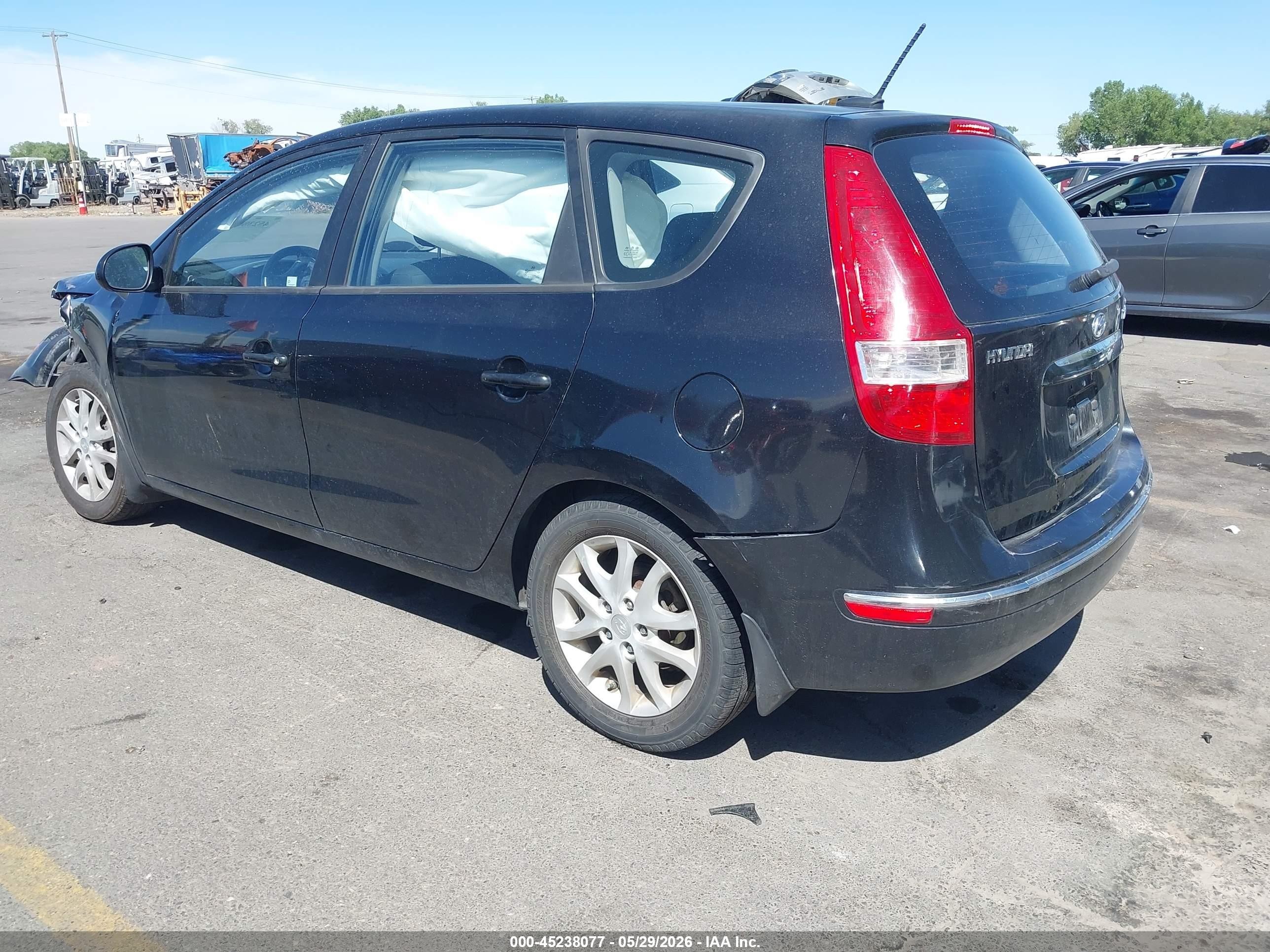 2009 Hyundai Elantra Touring   Black vin: KMHDC86E19U021922