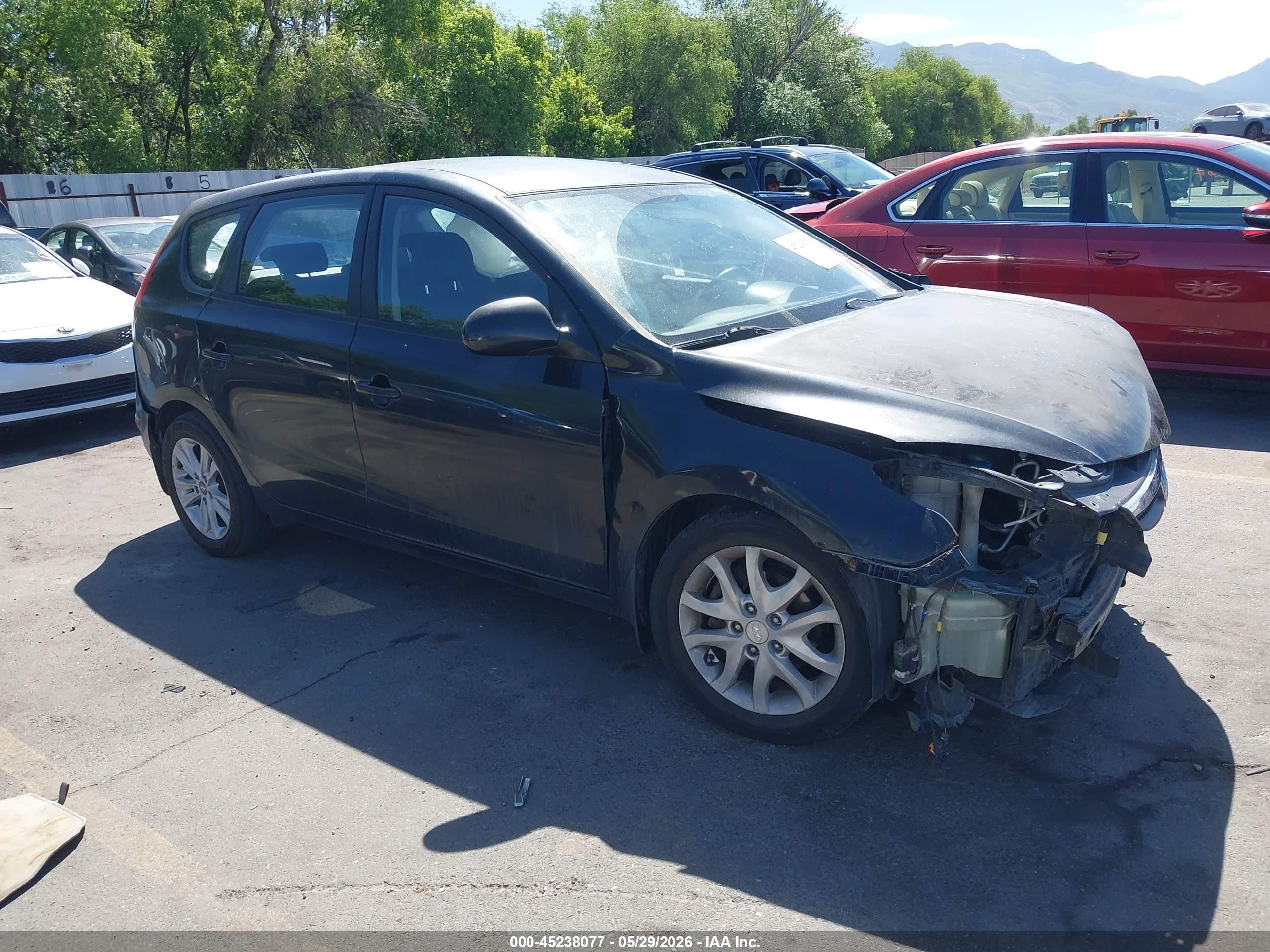2009 Hyundai Elantra Touring   Black vin: KMHDC86E19U021922