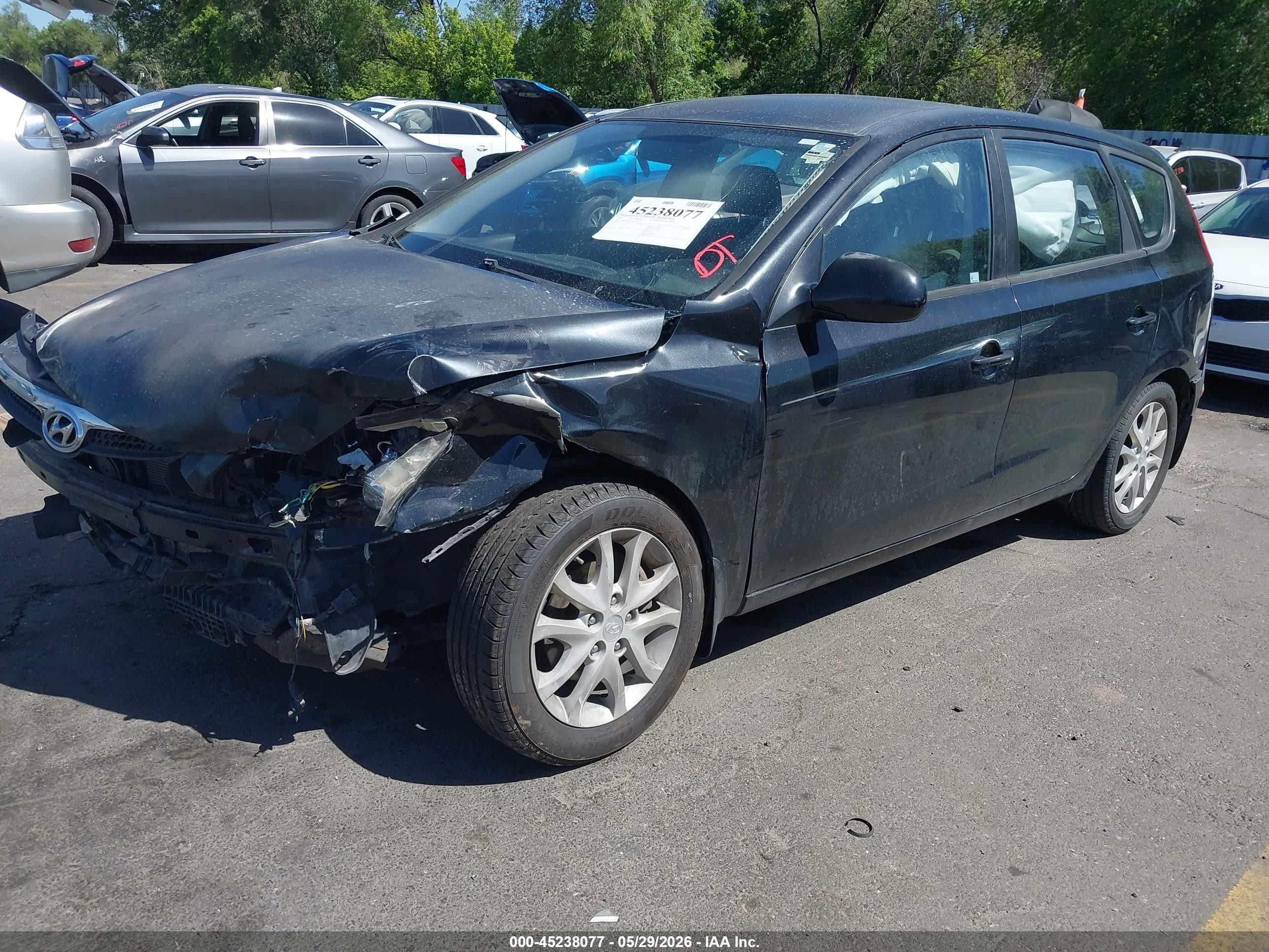 2009 Hyundai Elantra Touring   Black vin: KMHDC86E19U021922