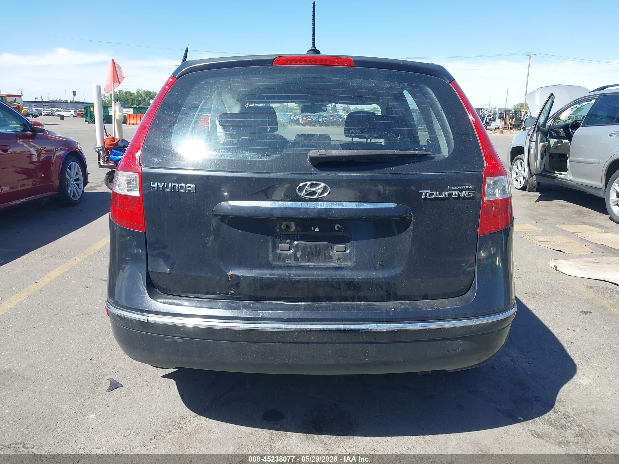 2009 Hyundai Elantra Touring   Black vin: KMHDC86E19U021922