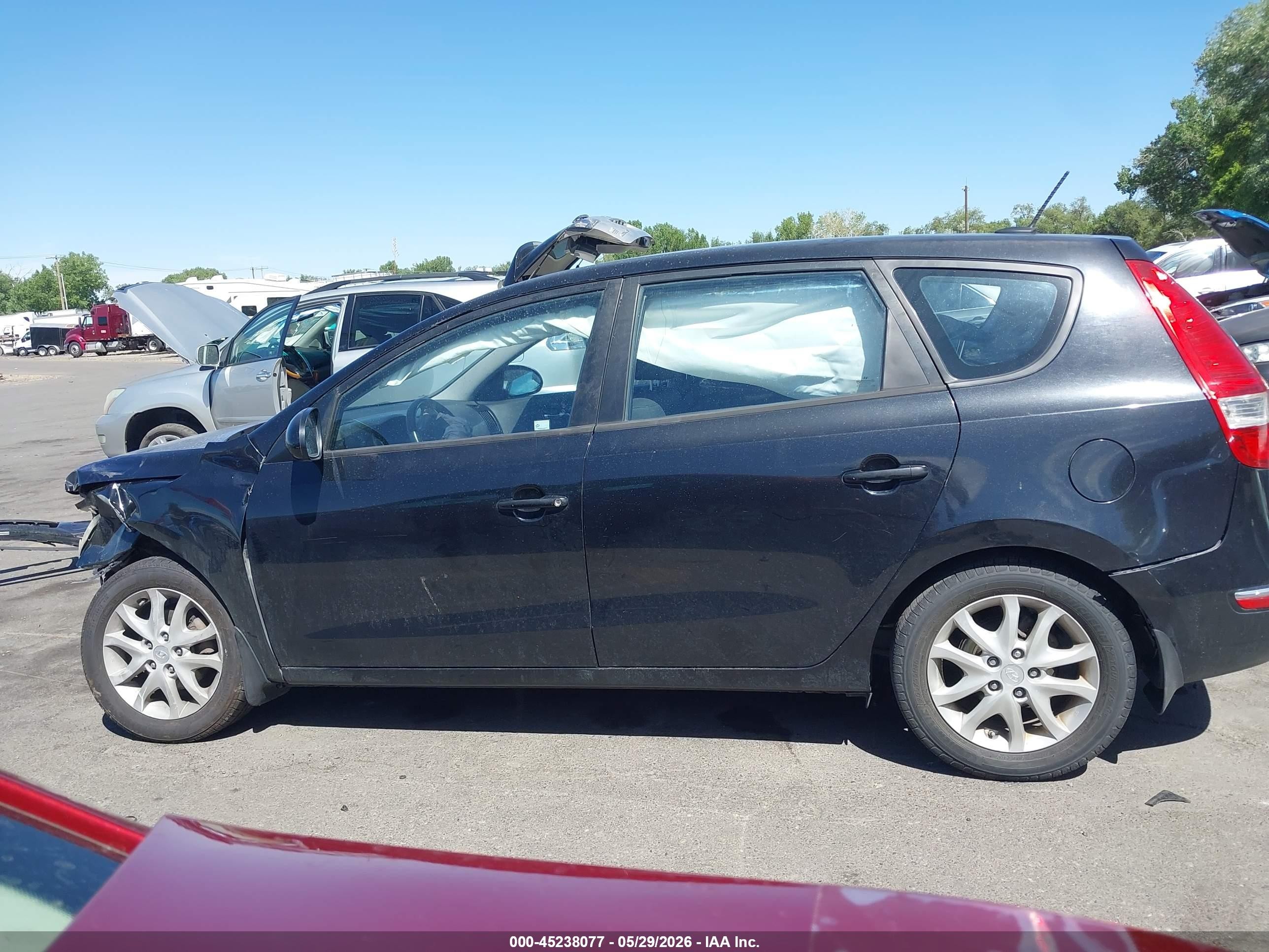 2009 Hyundai Elantra Touring   Black vin: KMHDC86E19U021922