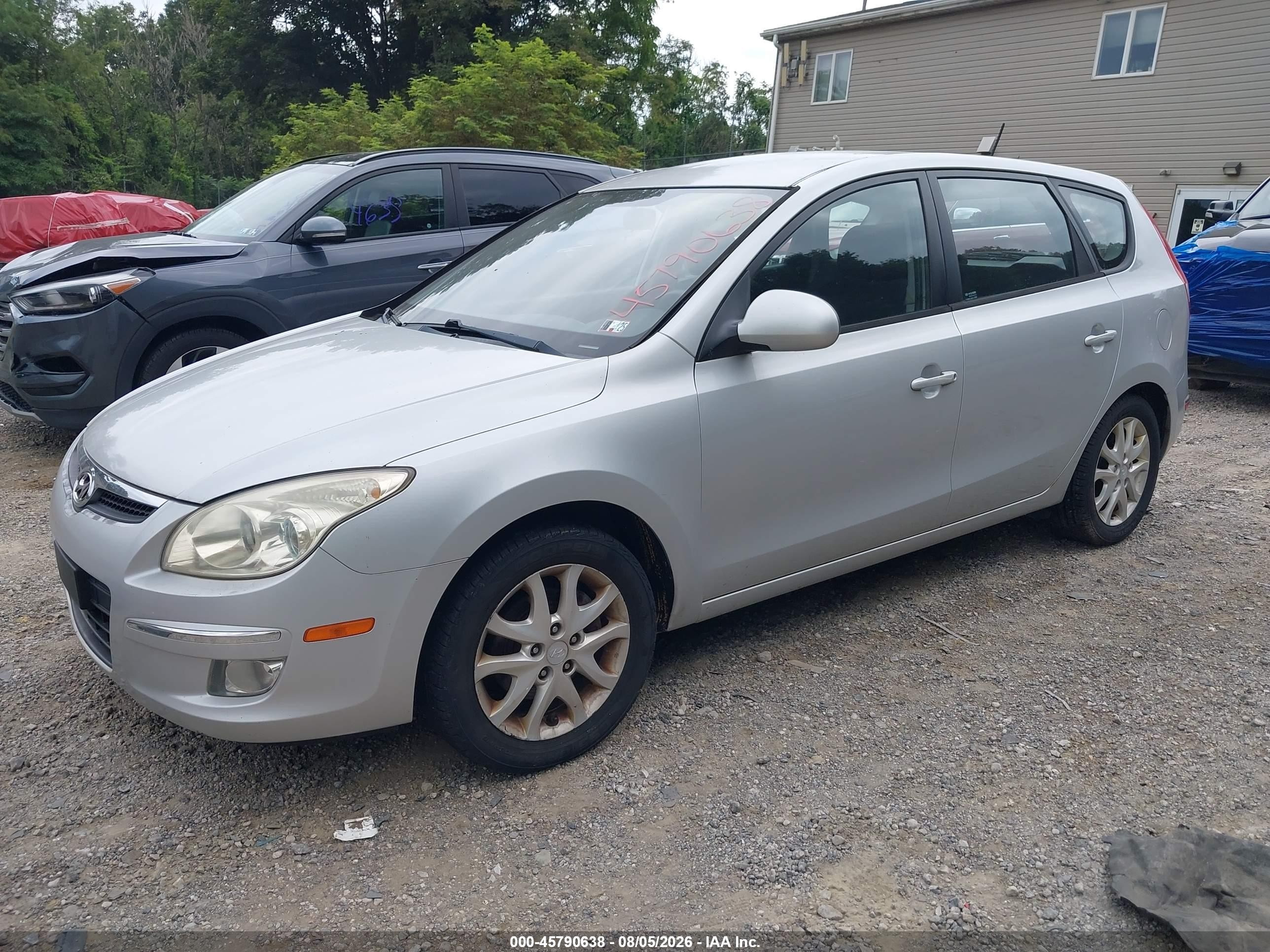 2009 Hyundai Elantra Touring Silver vin: KMHDC86E19U042611