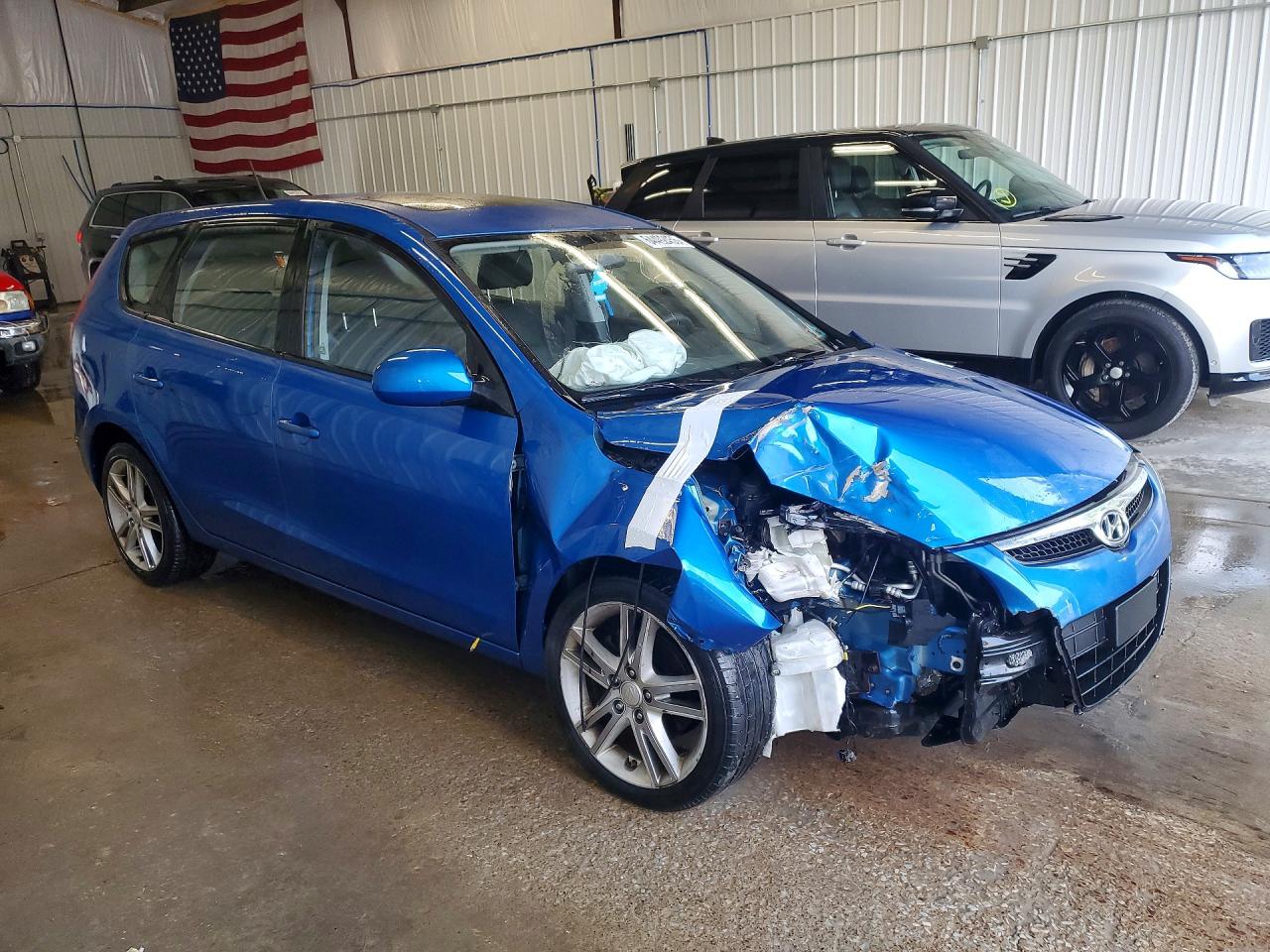 2009 Hyundai Elantra Touring Blue vin: KMHDC86E39U034512