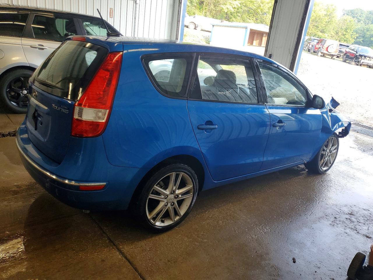 2009 Hyundai Elantra Touring Blue vin: KMHDC86E39U034512
