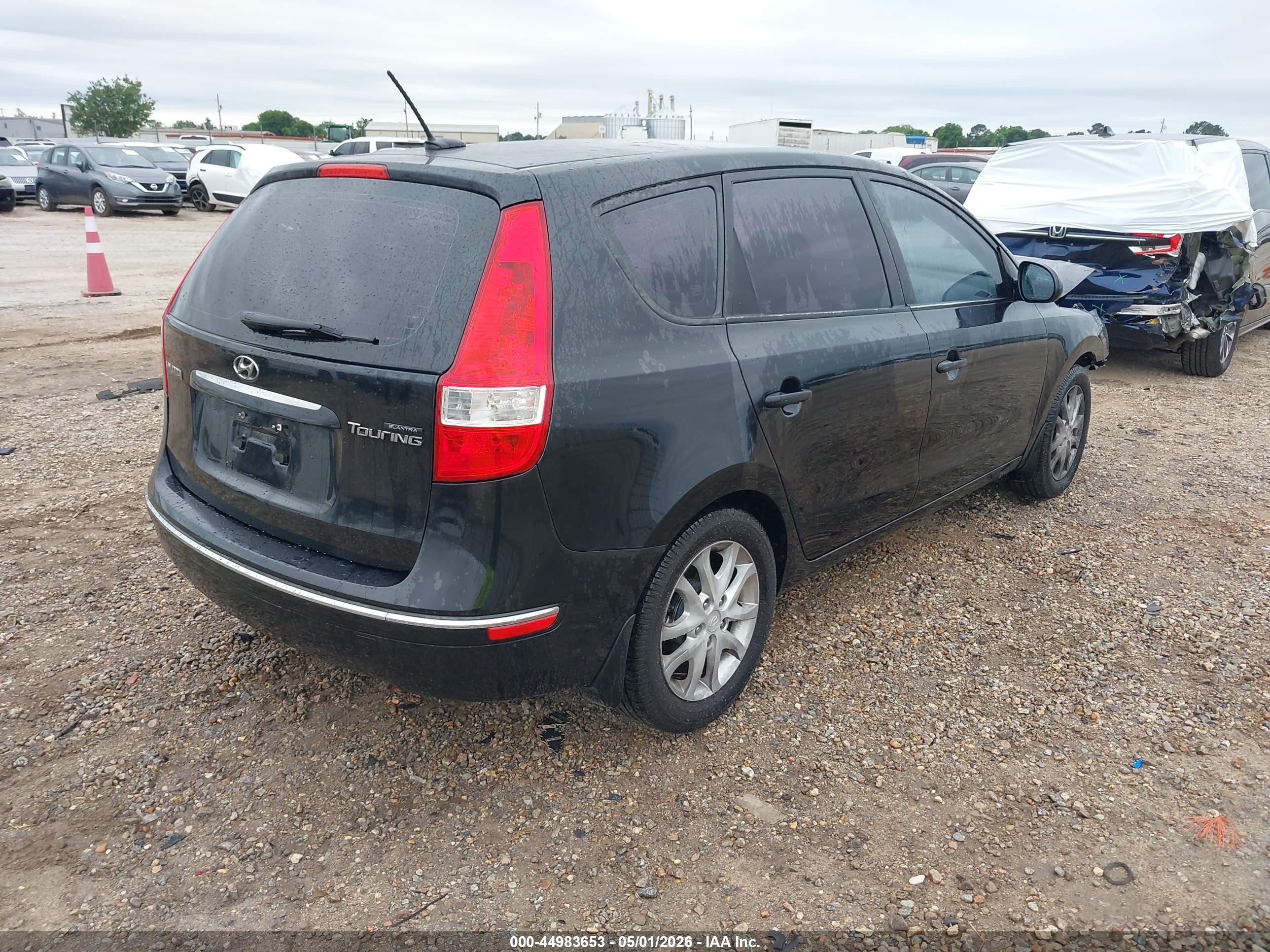 2009 Hyundai Elantra Touring   Black vin: KMHDC86E59U039159