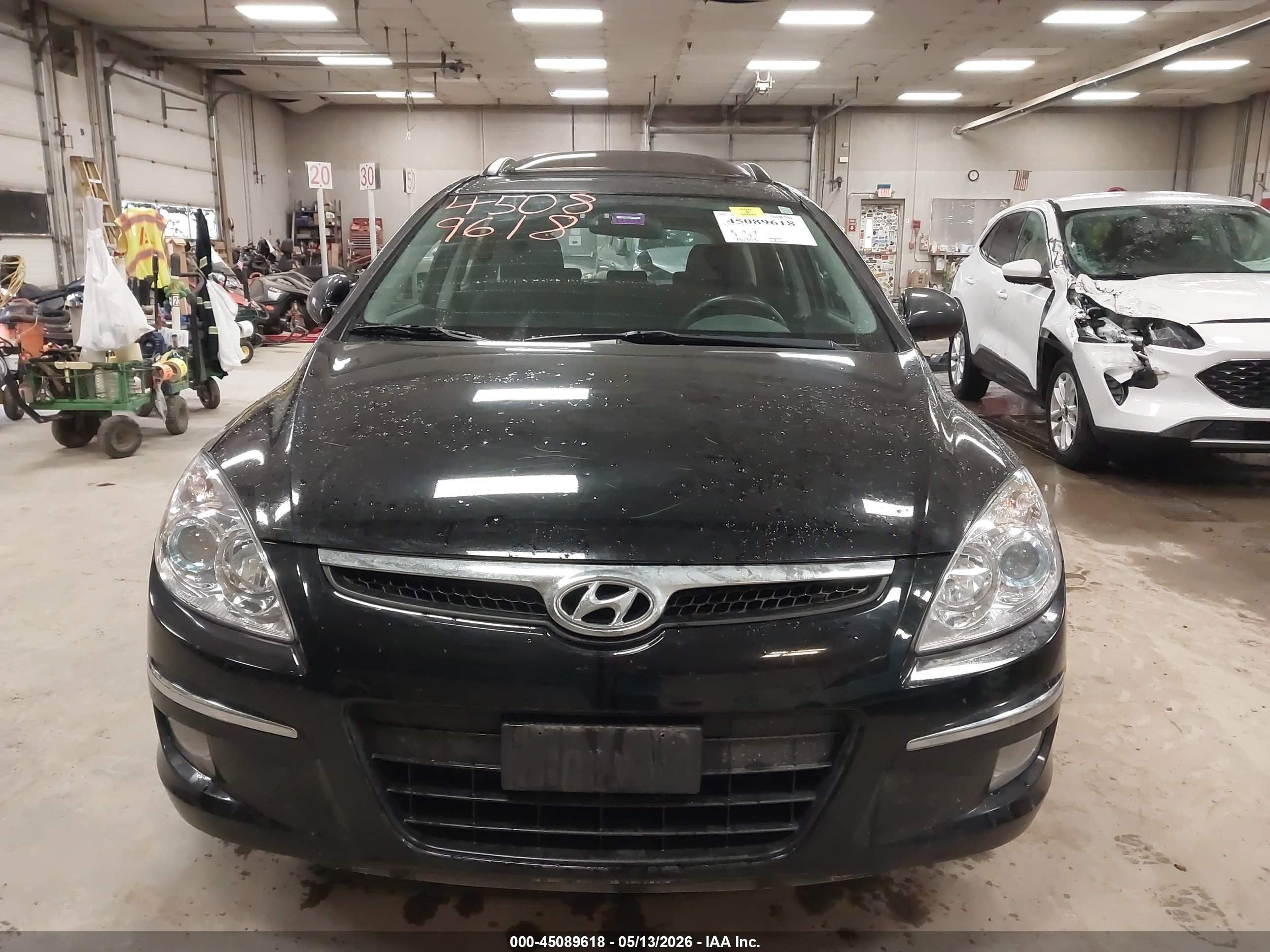 2010 Hyundai Elantra Touring Se Black vin: KMHDC8AE1AU075751