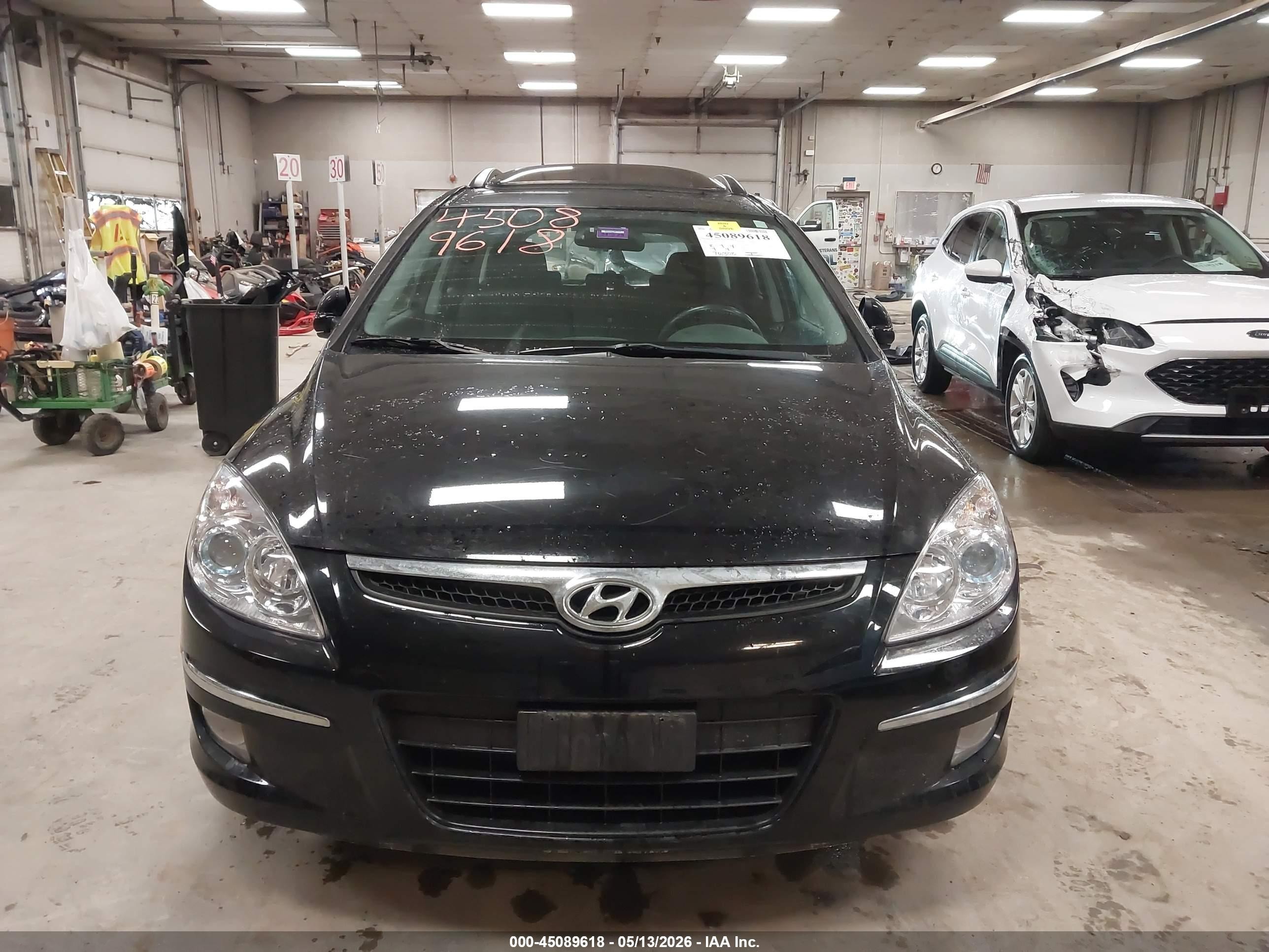 2010 Hyundai Elantra Touring Se Black vin: KMHDC8AE1AU075751