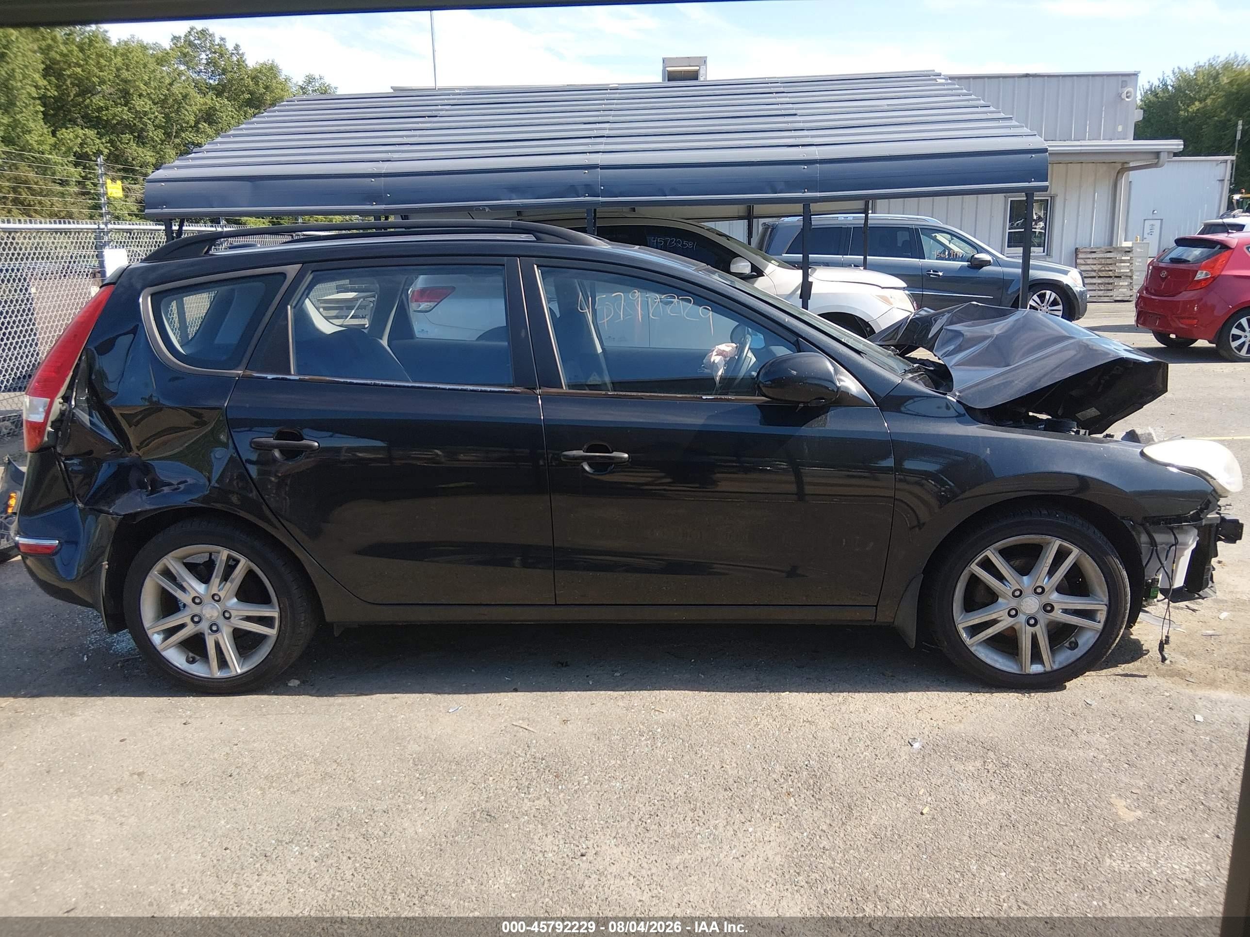 2010 Hyundai Elantra Touring Se Black vin: KMHDC8AE6AU051719
