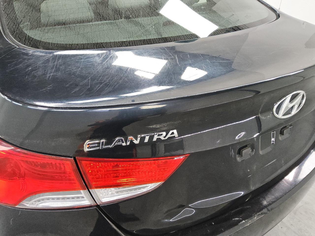 2013 Hyundai Elantra Gls Black vin: KMHDH4AE1DU656410 Damage: Deck Lid, Dent(S) W/ Paint Dmg, 3 To 4 Inches