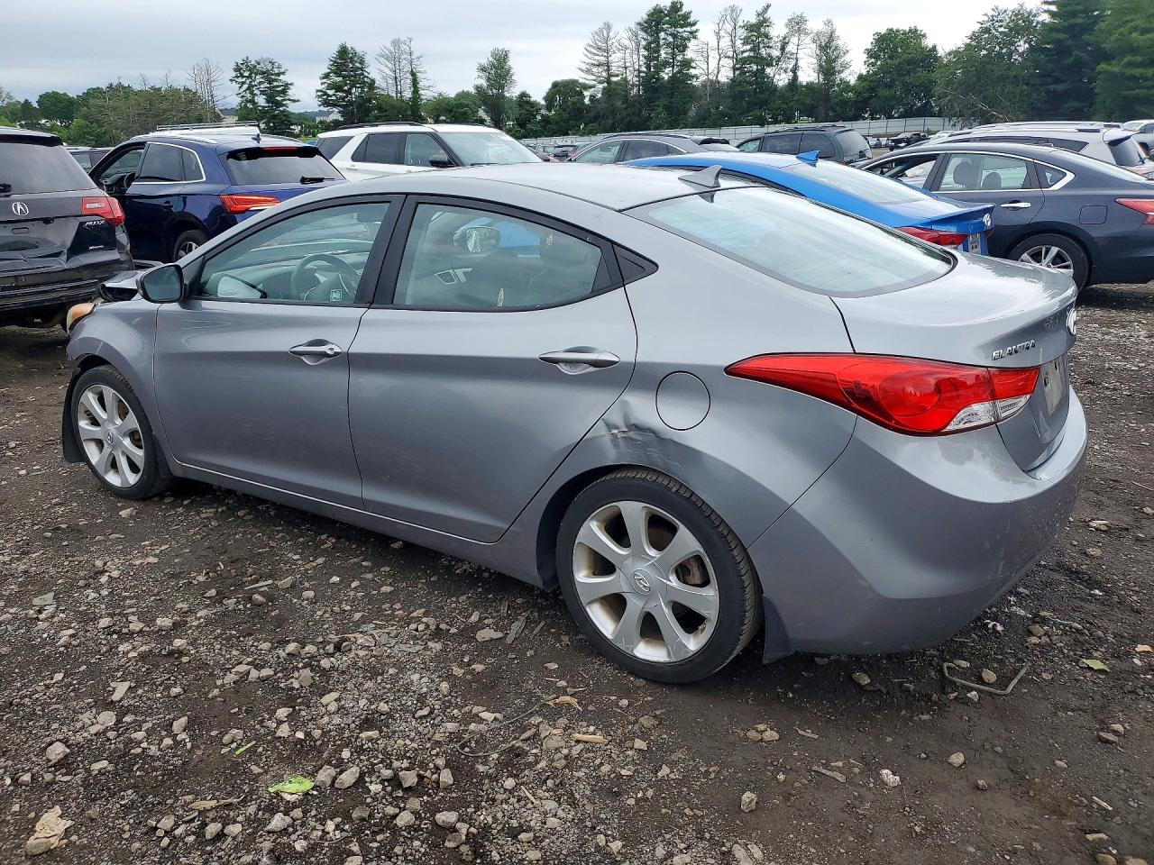 2012 Hyundai Elantra Limited Серебряный vin: KMHDH4AE3CU393822