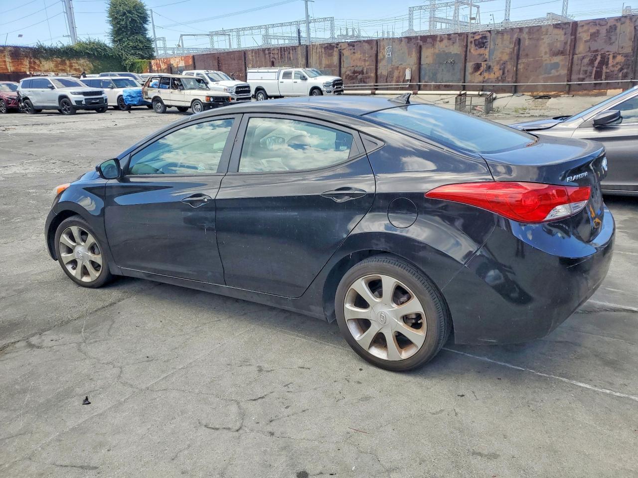 2012 Hyundai Elantra Limited Black vin: KMHDH4AE7CU257063