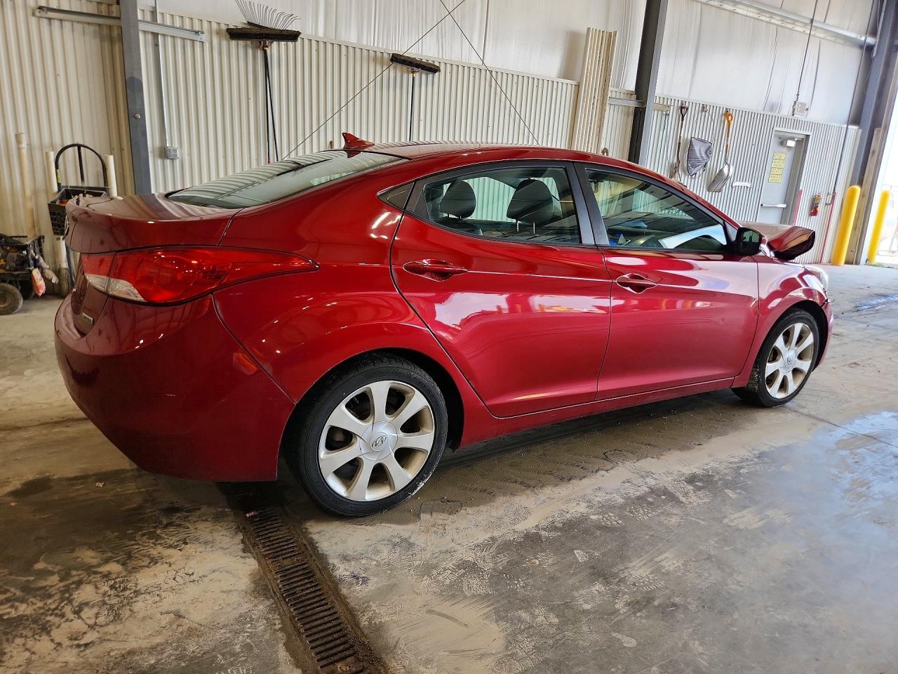 2012 Hyundai Elantra Limited Burgundy vin: KMHDH4AE7CU308884