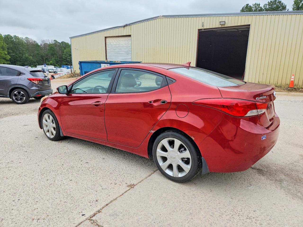 2012 Hyundai Elantra Limited Red vin: KMHDH4AE7CU342601