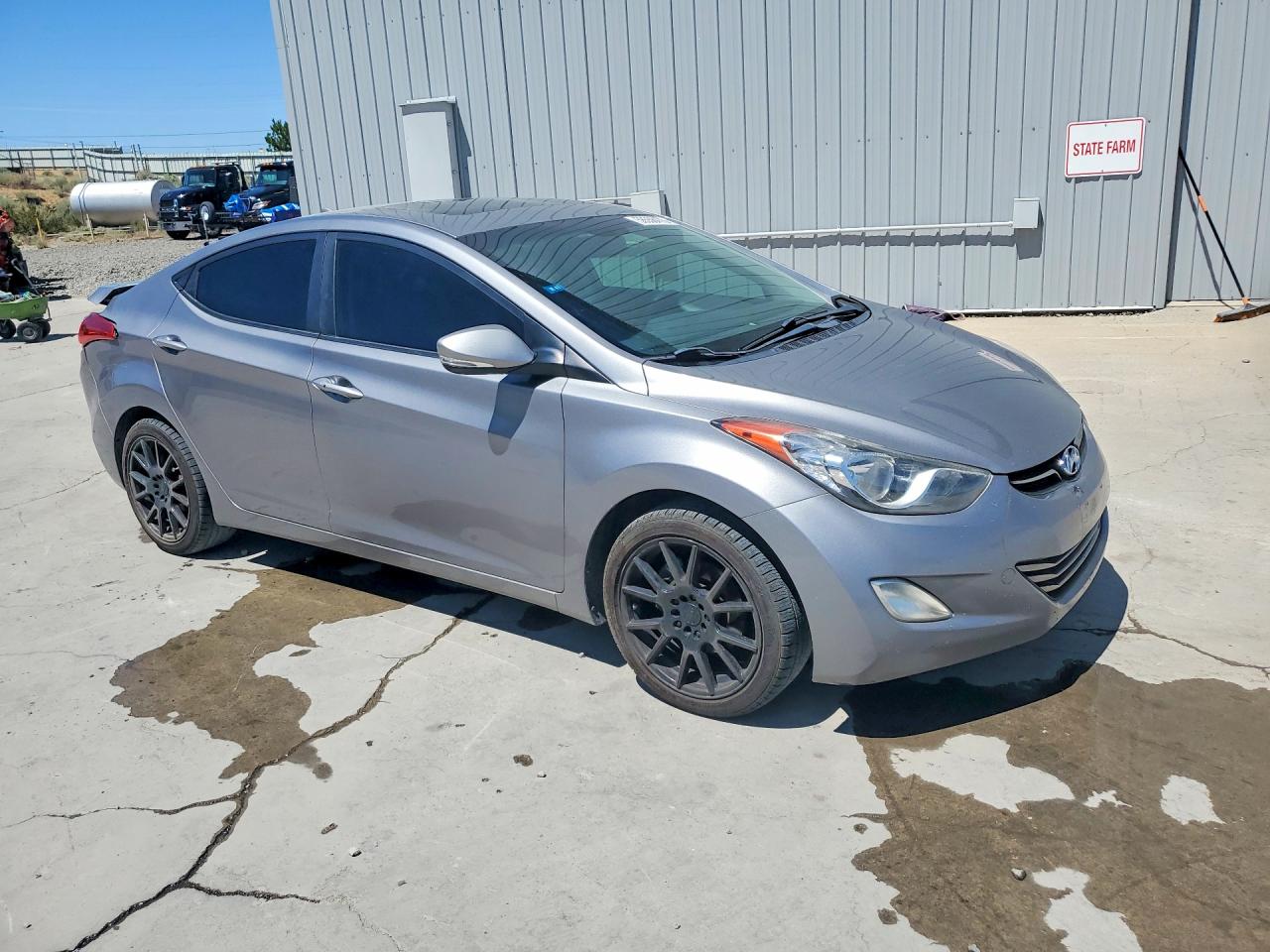 2012 Hyundai Elantra Limited Серебряный vin: KMHDH4AE9CU223125