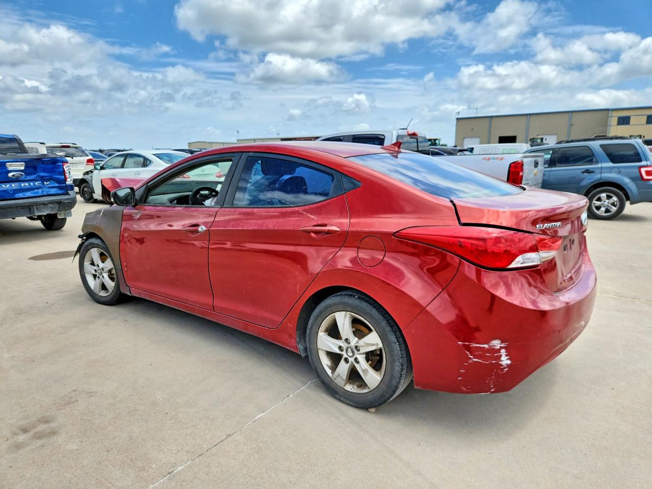2010 Hyun Elantra Red vin: KMHDH4AEXBU156047