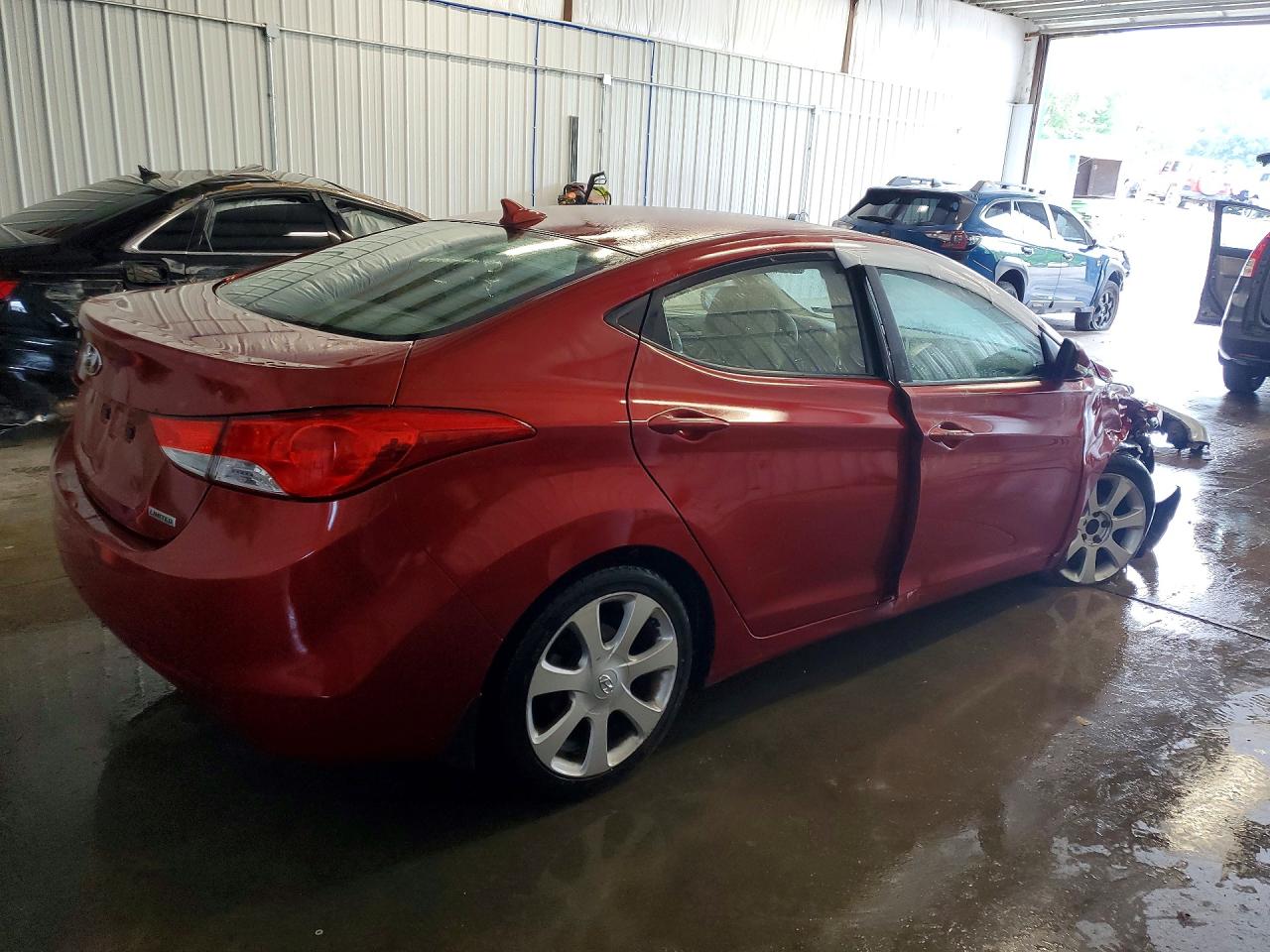 2012 Hyundai Elantra Limited Red vin: KMHDH4AEXCU357092