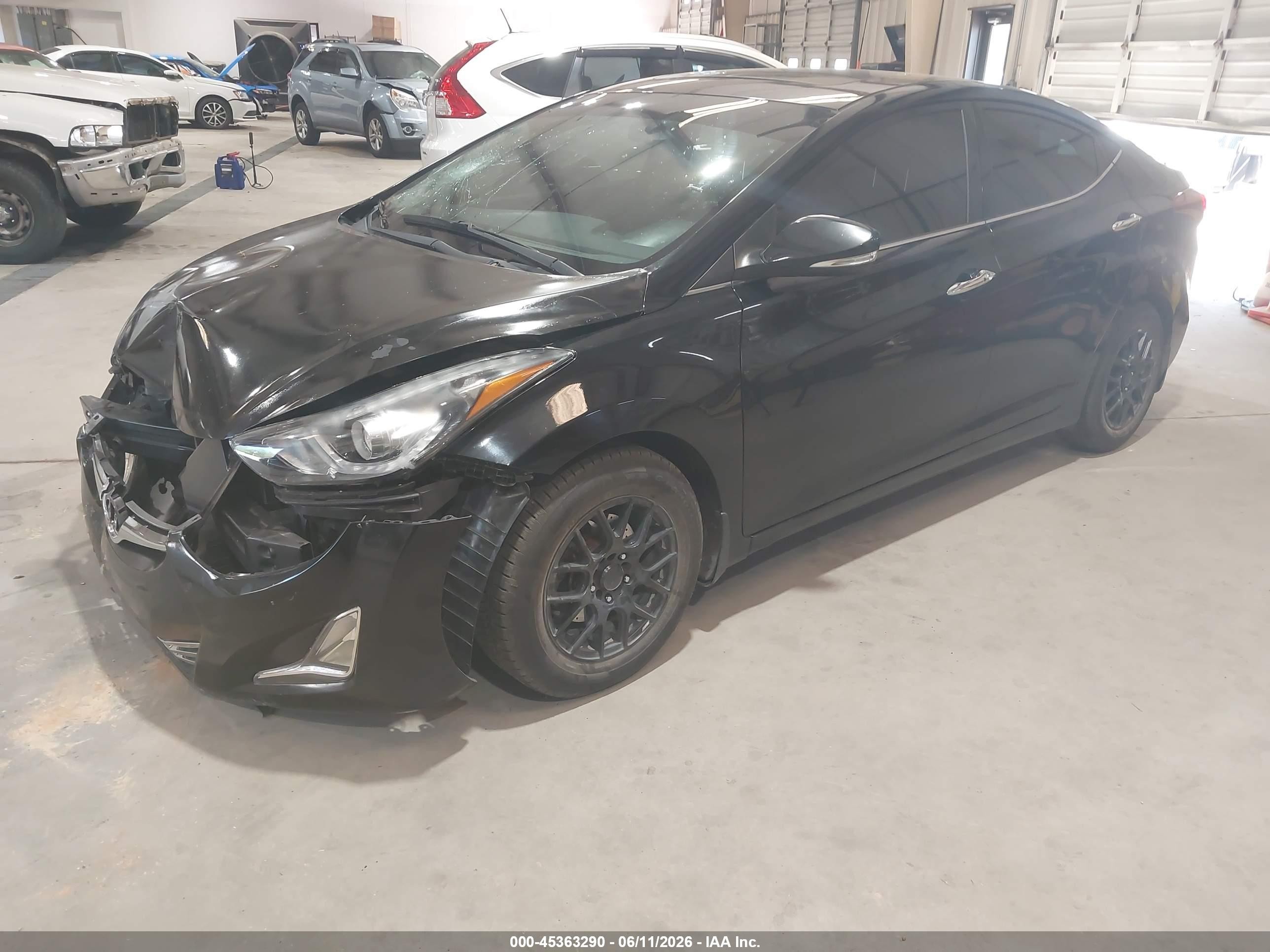2014 Hyundai Elantra Limited Black vin: KMHDH4AEXEU202013