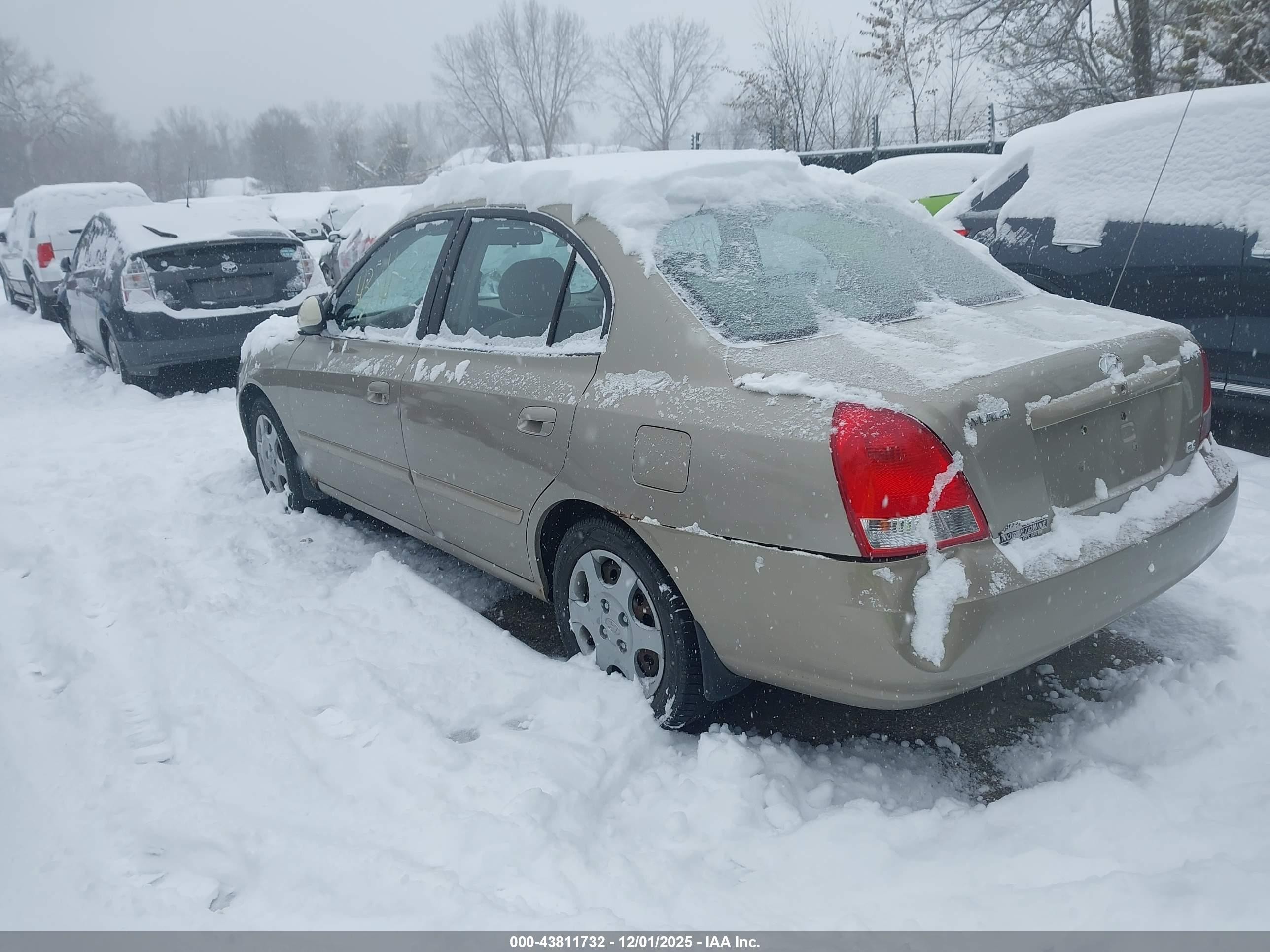 2002 Hyundai Elantra Gls Tan vin: KMHDN45D72U410937