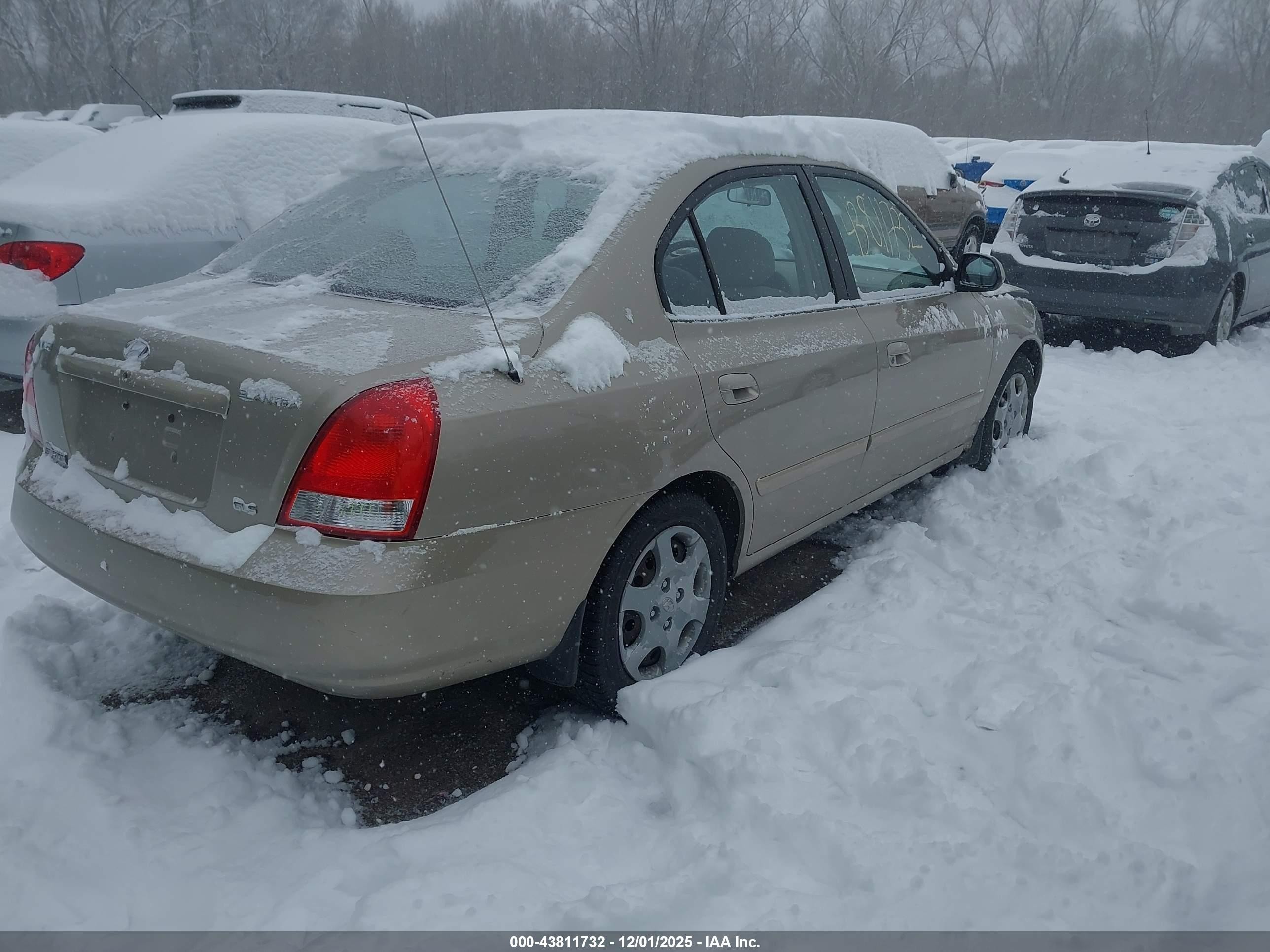 2002 Hyundai Elantra Gls Tan vin: KMHDN45D72U410937