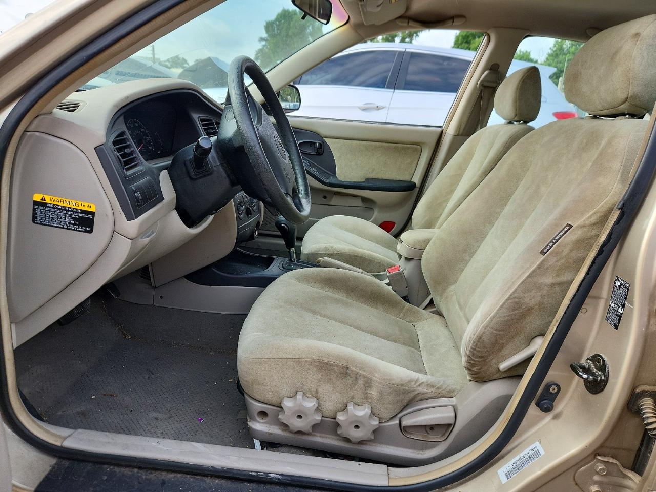 2003 Hyundai Elantra Gls Tan vin: KMHDN45D83U473840