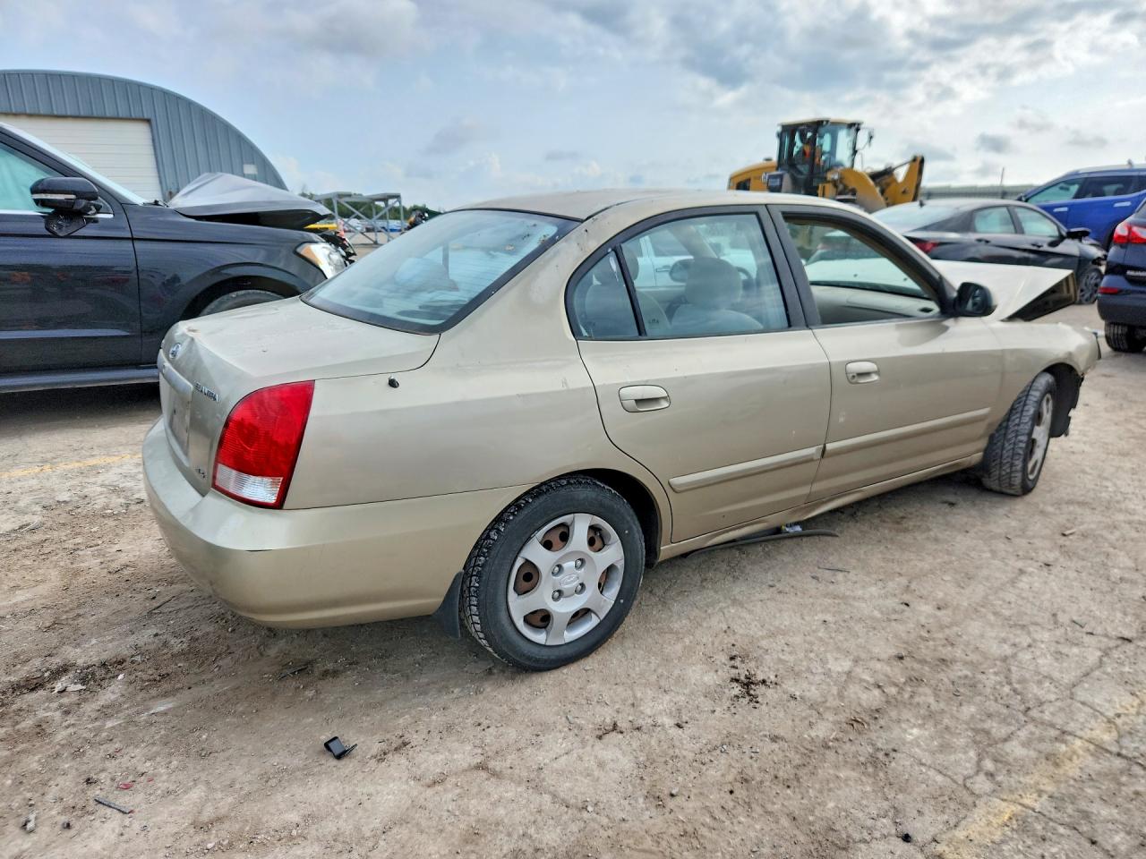 2003 Hyundai Elantra Gls Tan vin: KMHDN45D83U473840