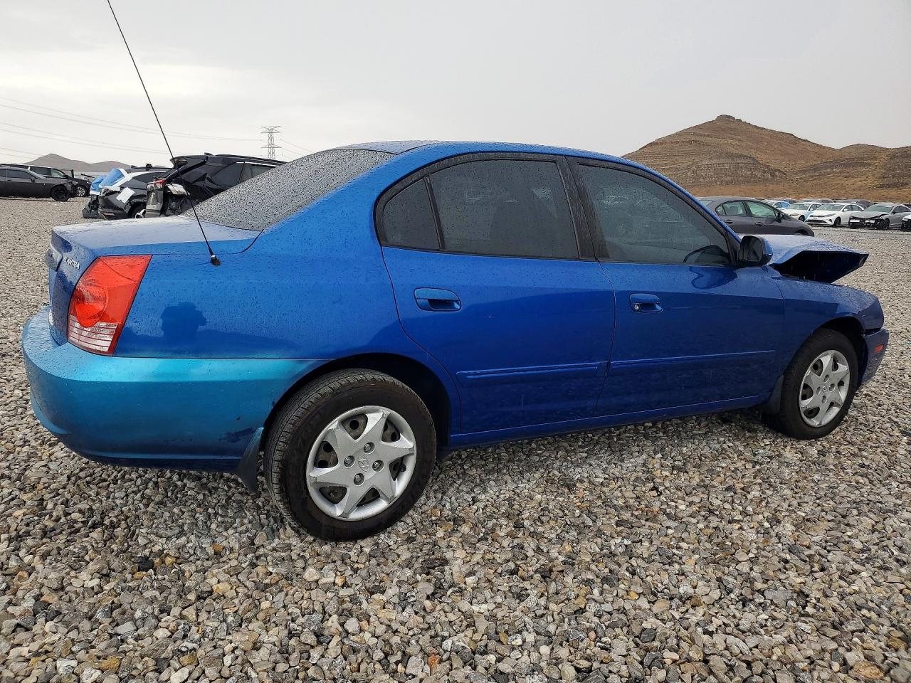 2004 Hyundai Elantra Blue vin: KMHDN46D14U873335