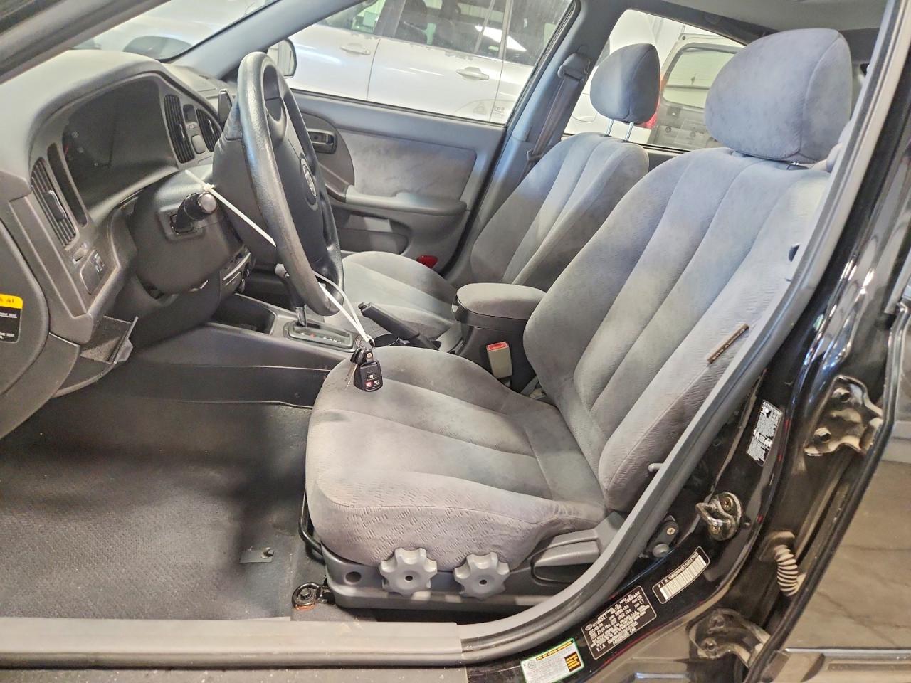 2005 Hyundai Elantra Gls Black vin: KMHDN46D15U037655