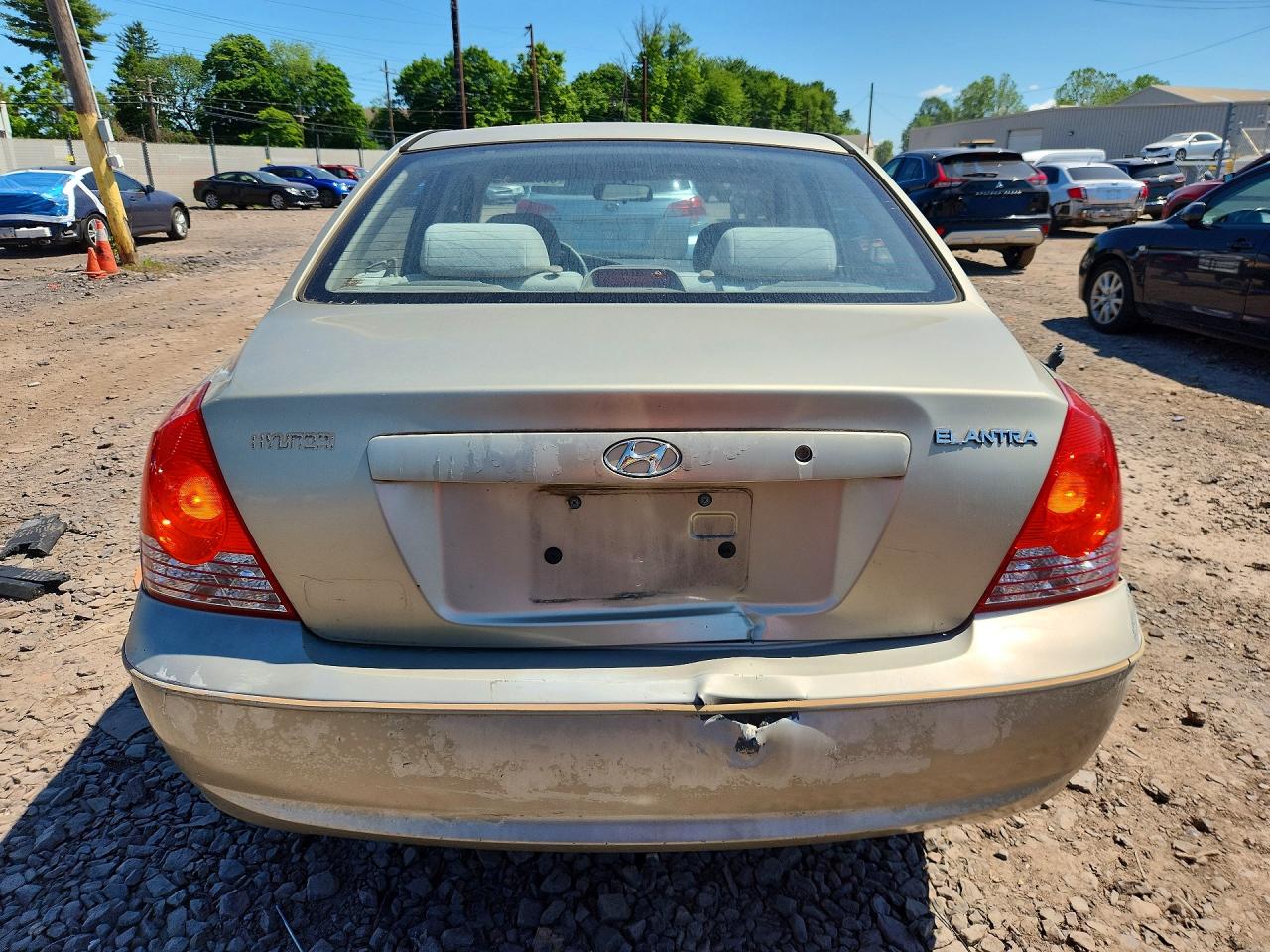 2005 Hyundai Elantra Gls Tan vin: KMHDN46D55U962049