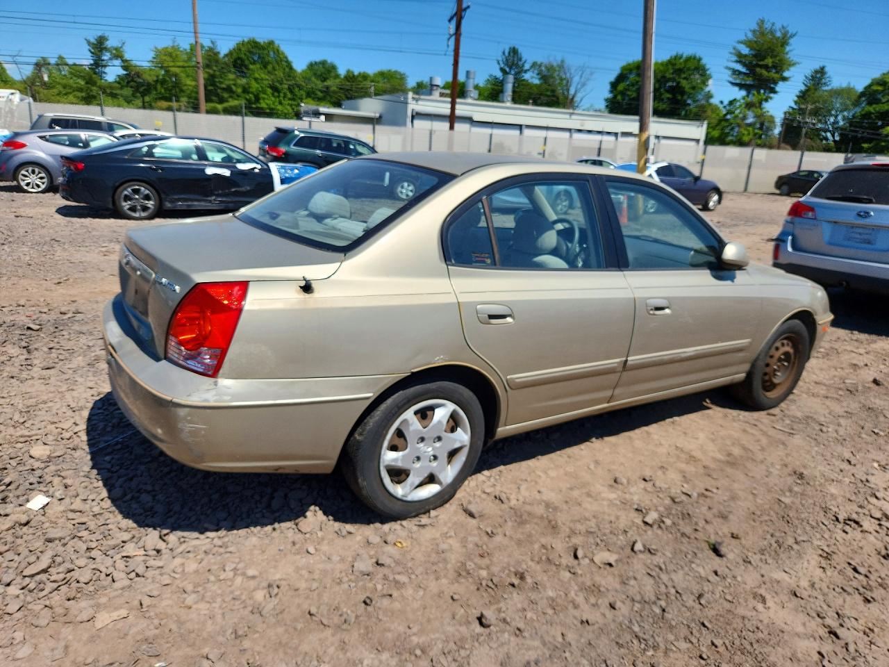2005 Hyundai Elantra Gls Tan vin: KMHDN46D55U962049