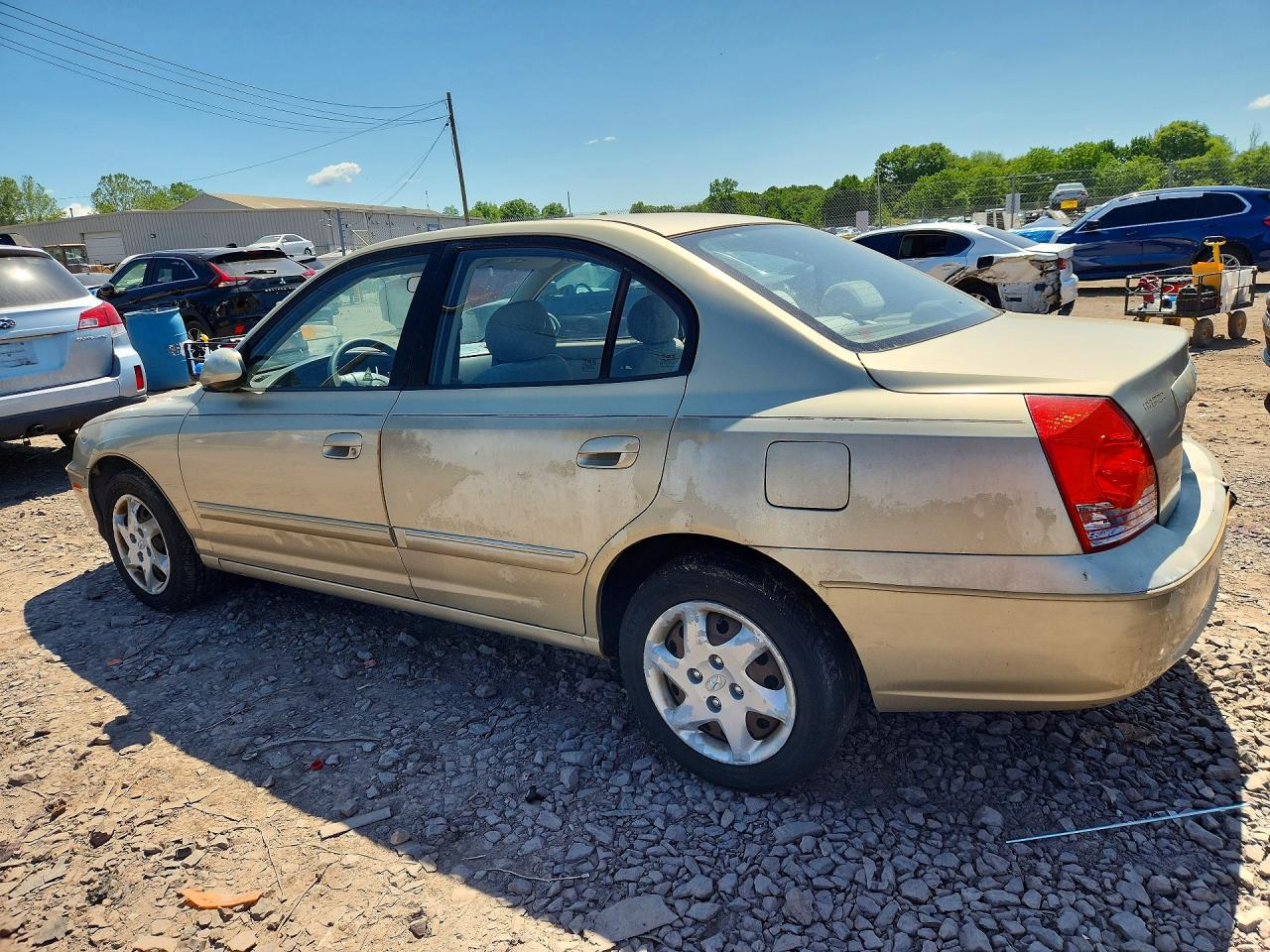 2005 Hyundai Elantra Gls Tan vin: KMHDN46D55U962049