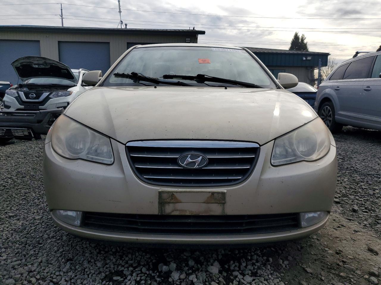2007 Hyundai Elantra Base Бежевый vin: KMHDU46D17U167912