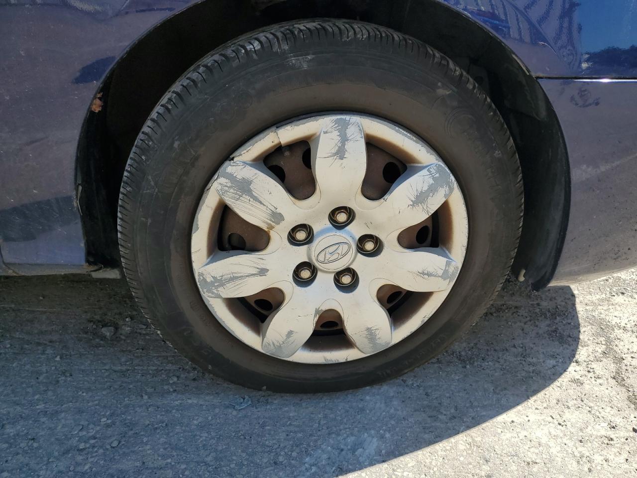2007 Hyundai Elantra Gls Blue vin: KMHDU46D57U023571 Damage: Right Front Wheel Cover, Broken, Replacement Required