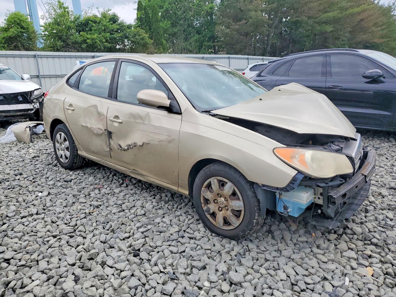 2007 Hyundai Elantra Tan vin: KMHDU46D77U195102