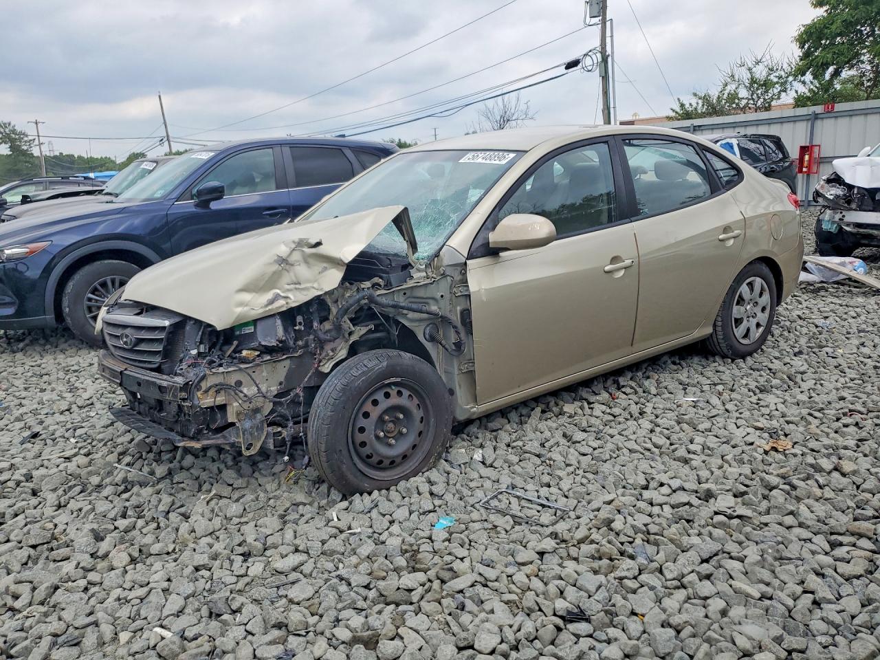 2007 Hyundai Elantra Tan vin: KMHDU46D77U195102
