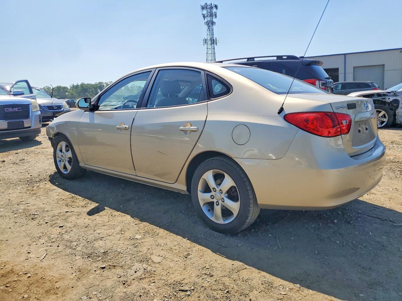 2007 Hyundai Elantra Gls Tan vin: KMHDU46DX7U074533