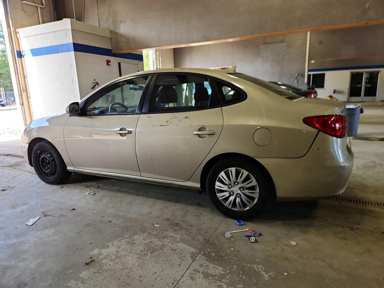 2010 Hyundai Elantragls Beige vin: KMHDU4AD7AU899847