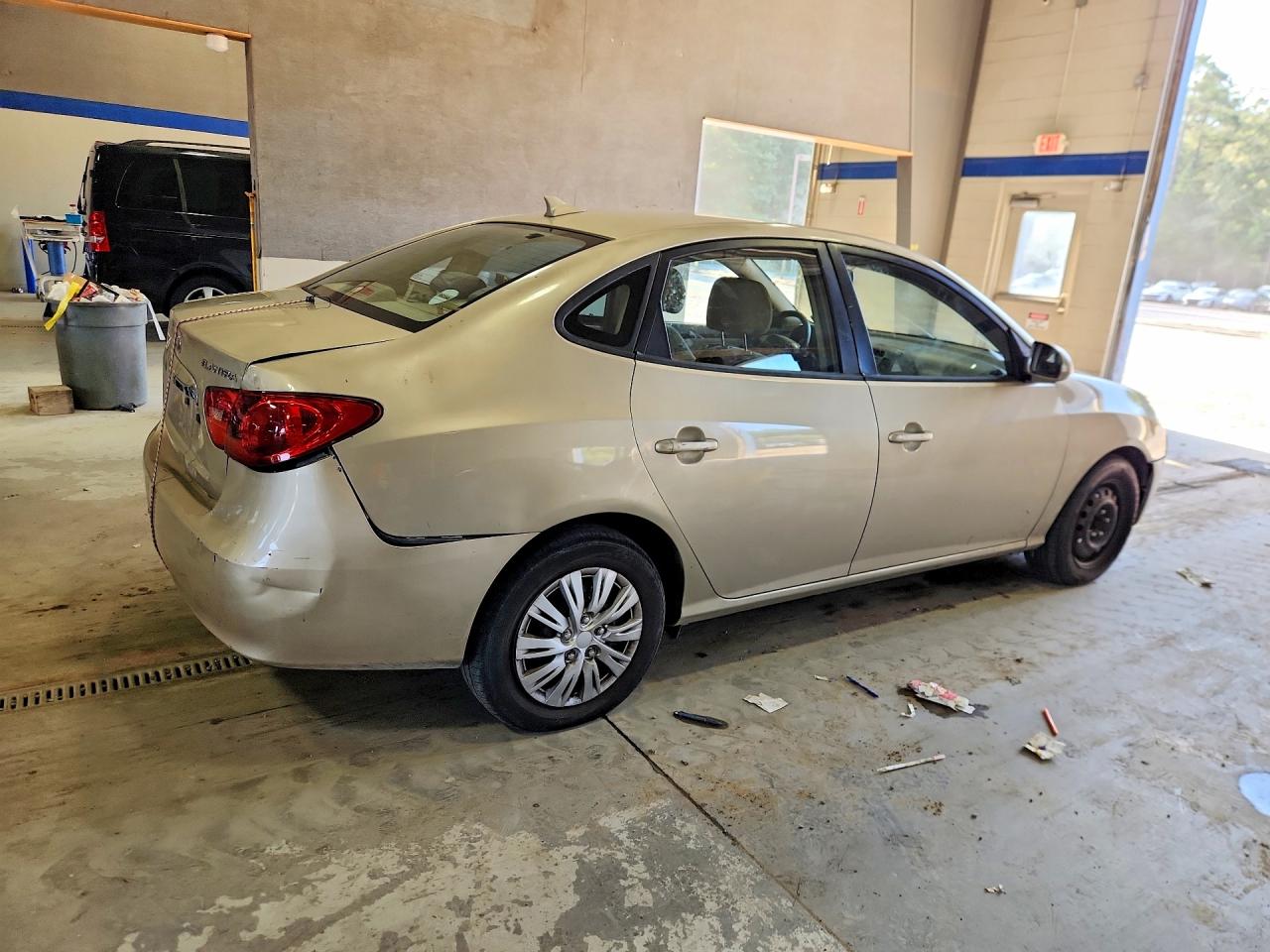 2010 Hyundai Elantragls Beige vin: KMHDU4AD7AU899847