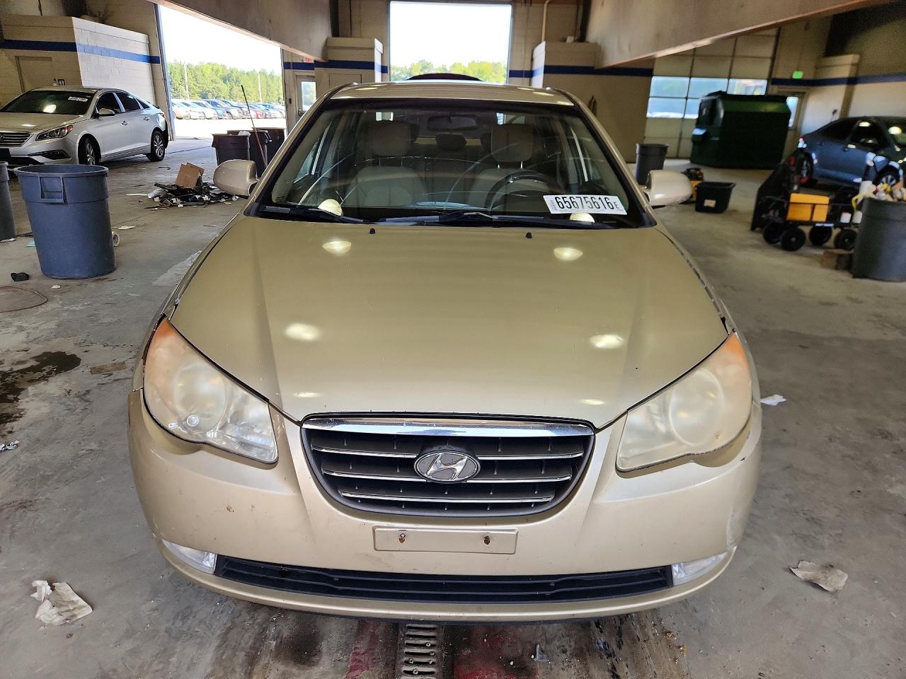 2010 Hyundai Elantragls Beige vin: KMHDU4AD7AU899847