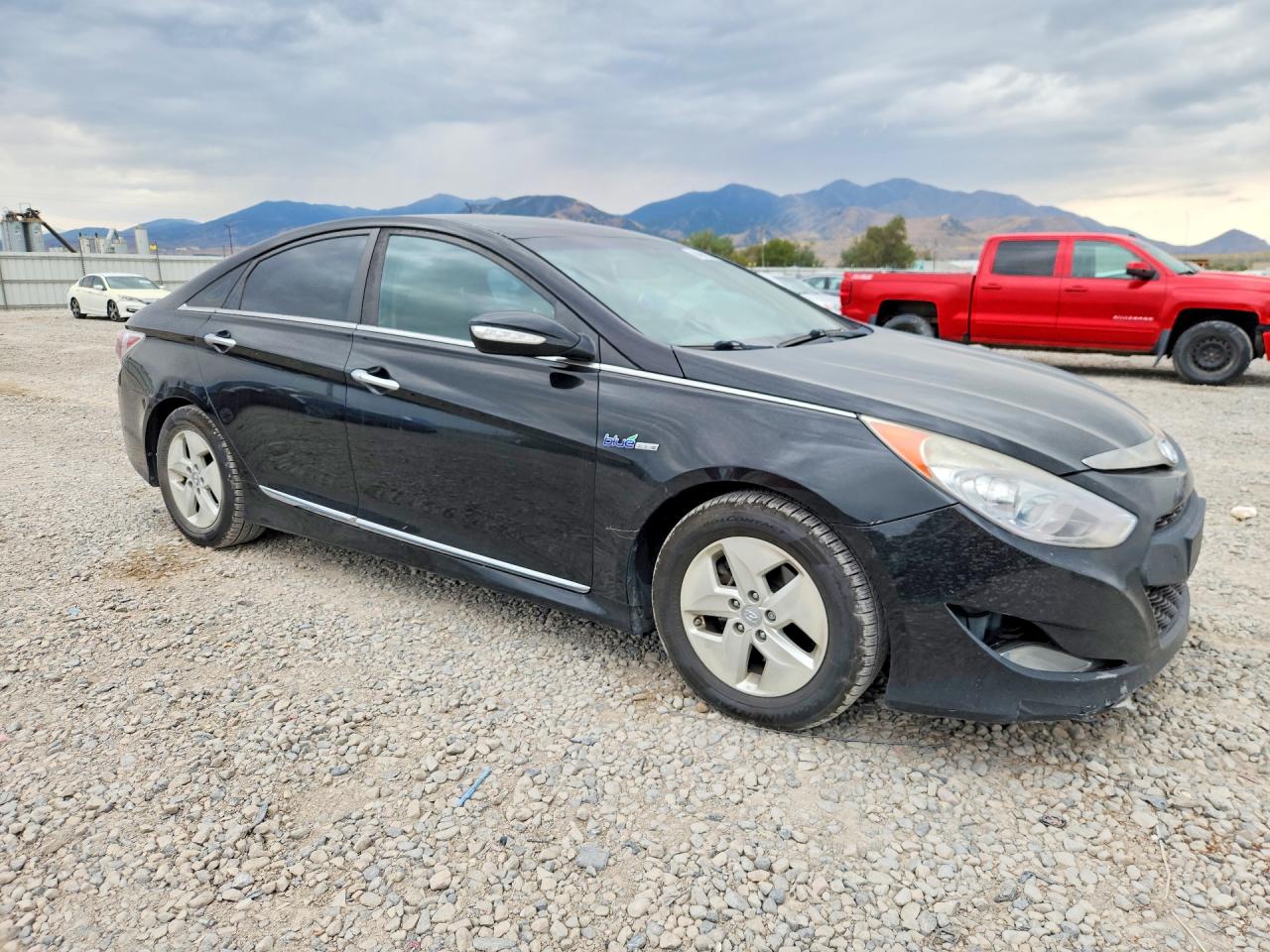2012 Hyundai Sonata Hybrid Black vin: KMHEC4A42CA028592