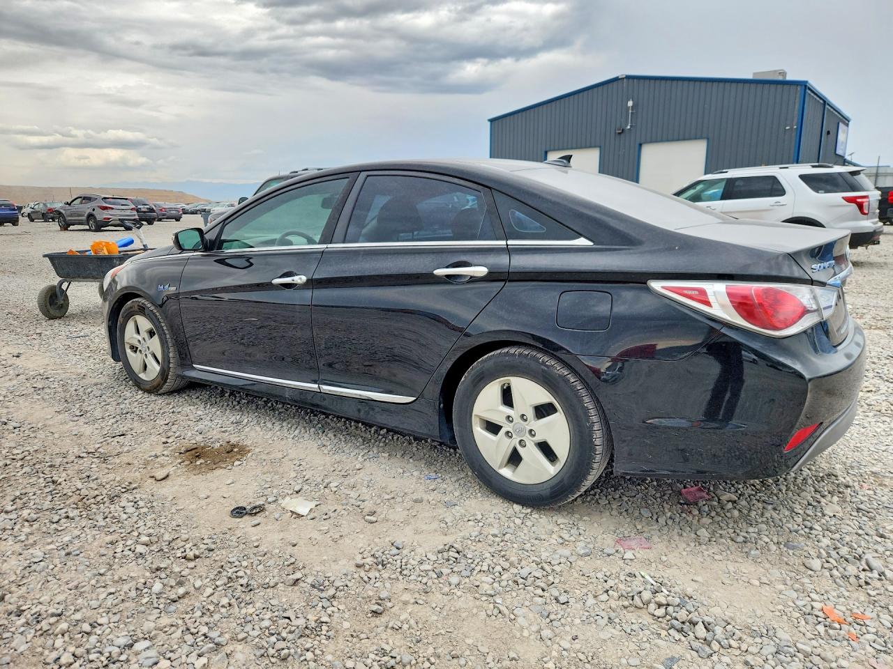 2012 Hyundai Sonata Hybrid Black vin: KMHEC4A42CA028592