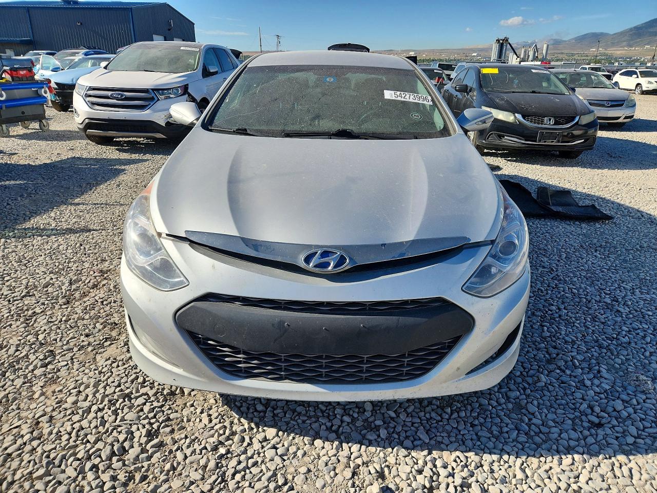 2015 Hyundai Sonata Hybrid Base Серебряный vin: KMHEC4A42FA128423