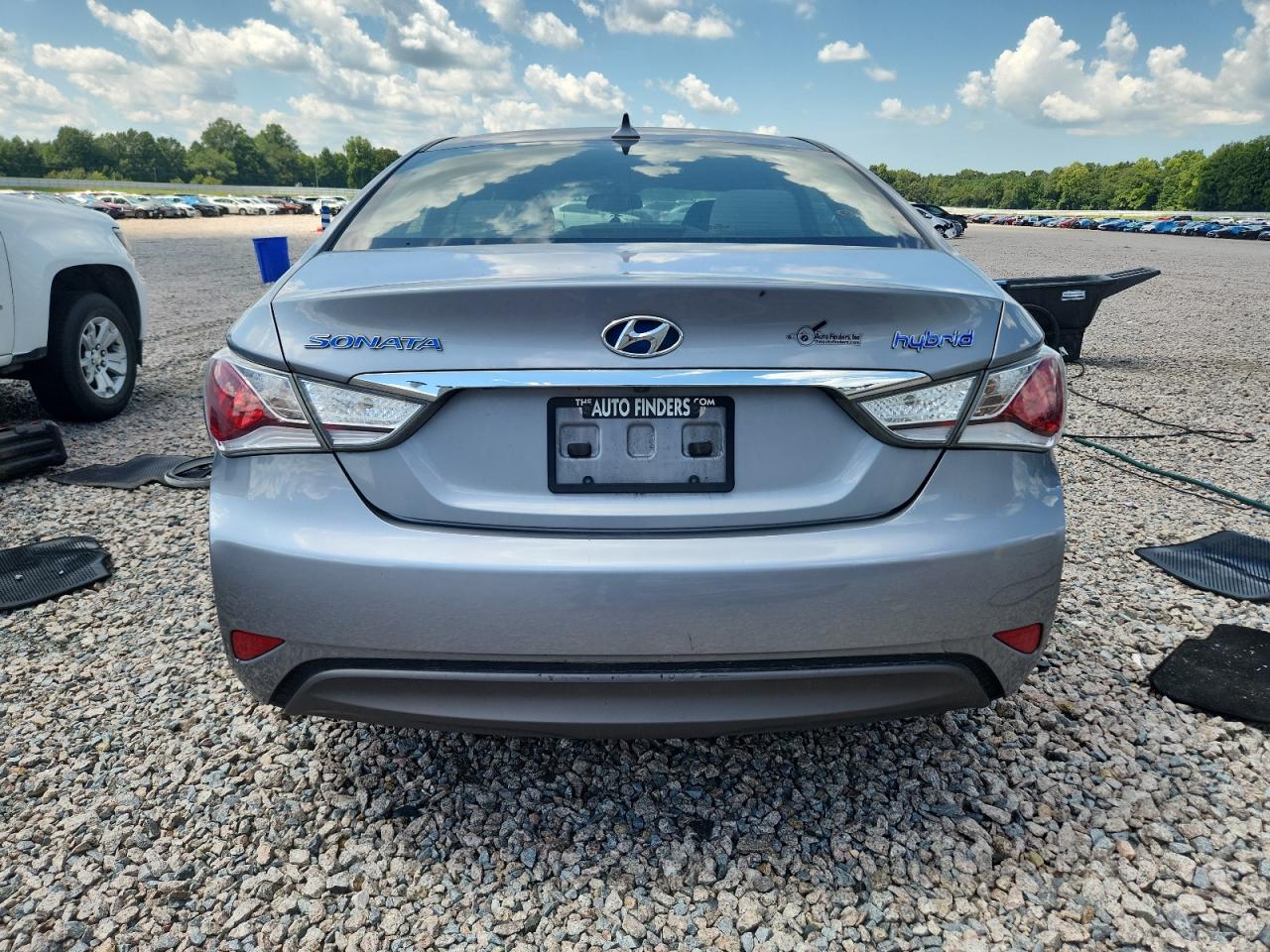 2014 Hyundai Sonata Hybrid Silver vin: KMHEC4A44EA117678 Damage: Rear Bumper/Cover, Heavy Scratch, < 1/8 Inch
