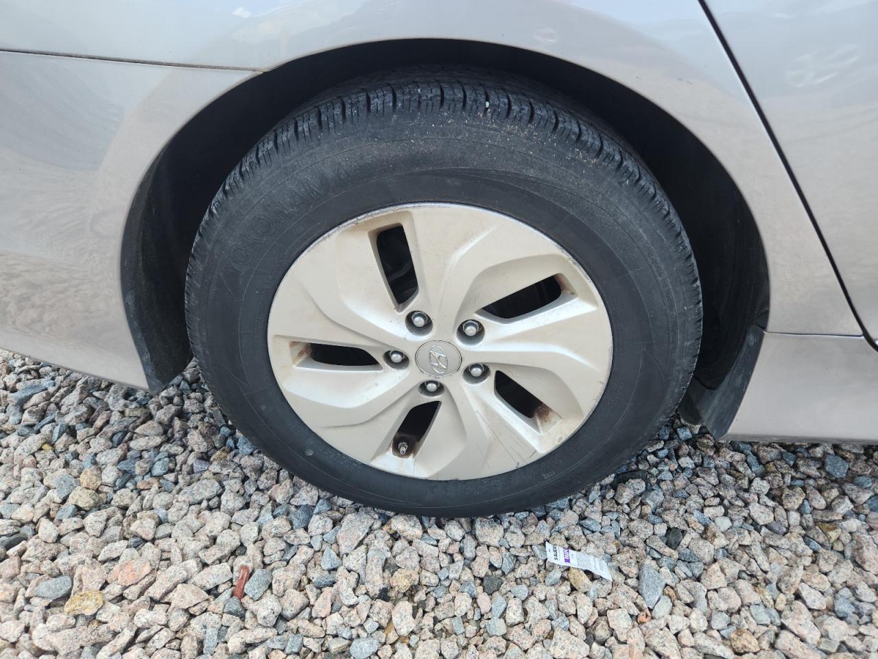 2014 Hyundai Sonata Hybrid Silver vin: KMHEC4A44EA117678 Damage: Right Rear Wheel, Curb Rash, > 12 Inches