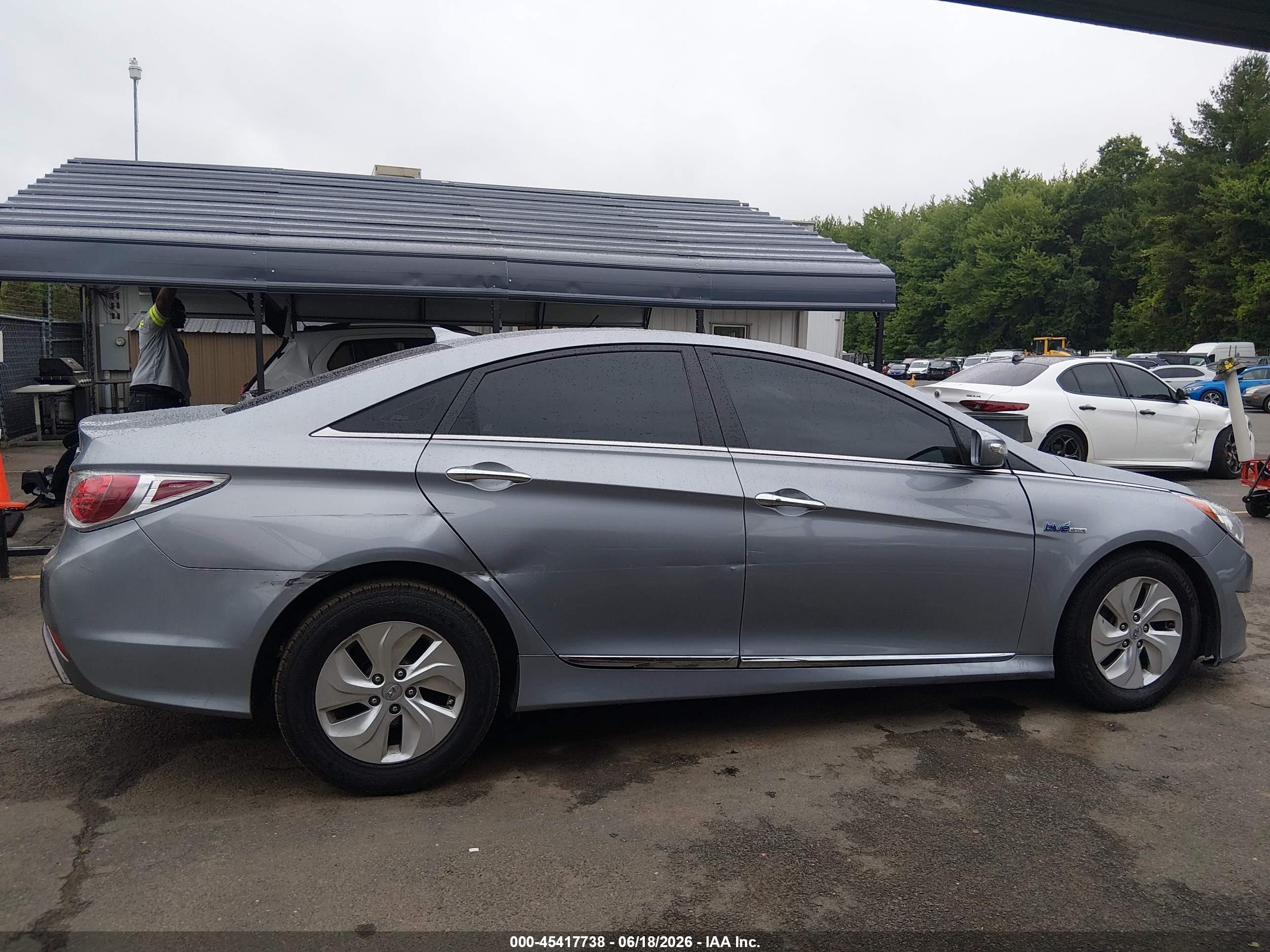 2015 Hyundai Sonata Hybrid   Серебряный vin: KMHEC4A4XFA139279