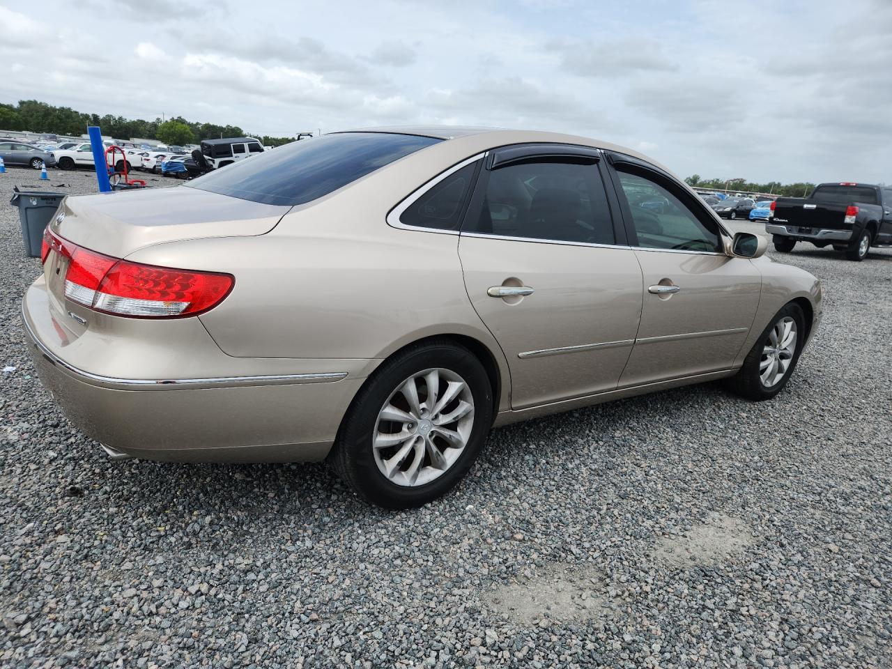 2006 Hyundai Azera Se Золотой vin: KMHFC46F36A050524
