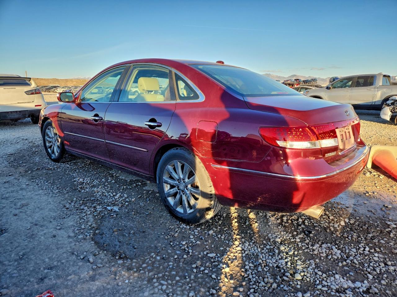 2009 Hyundai Azera Limited Burgundy vin: KMHFC46F49A358676