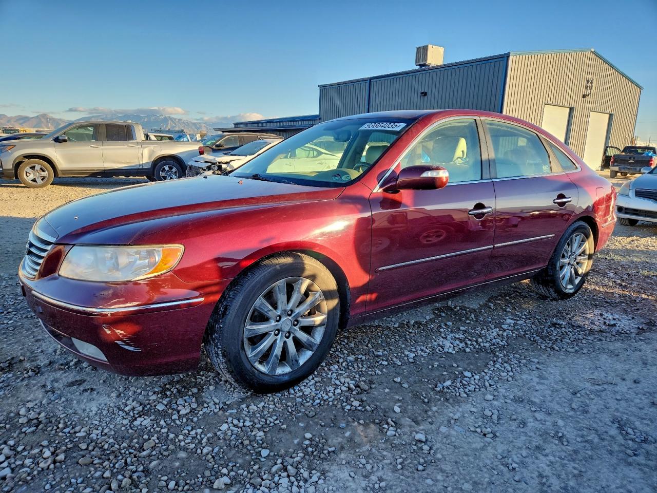 2009 Hyundai Azera Limited Burgundy vin: KMHFC46F49A358676