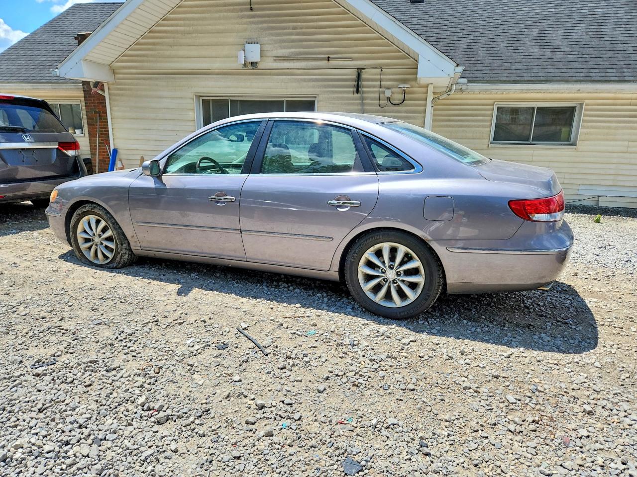 2006 Hyundai Azera Se Tan vin: KMHFC46FX6A085934