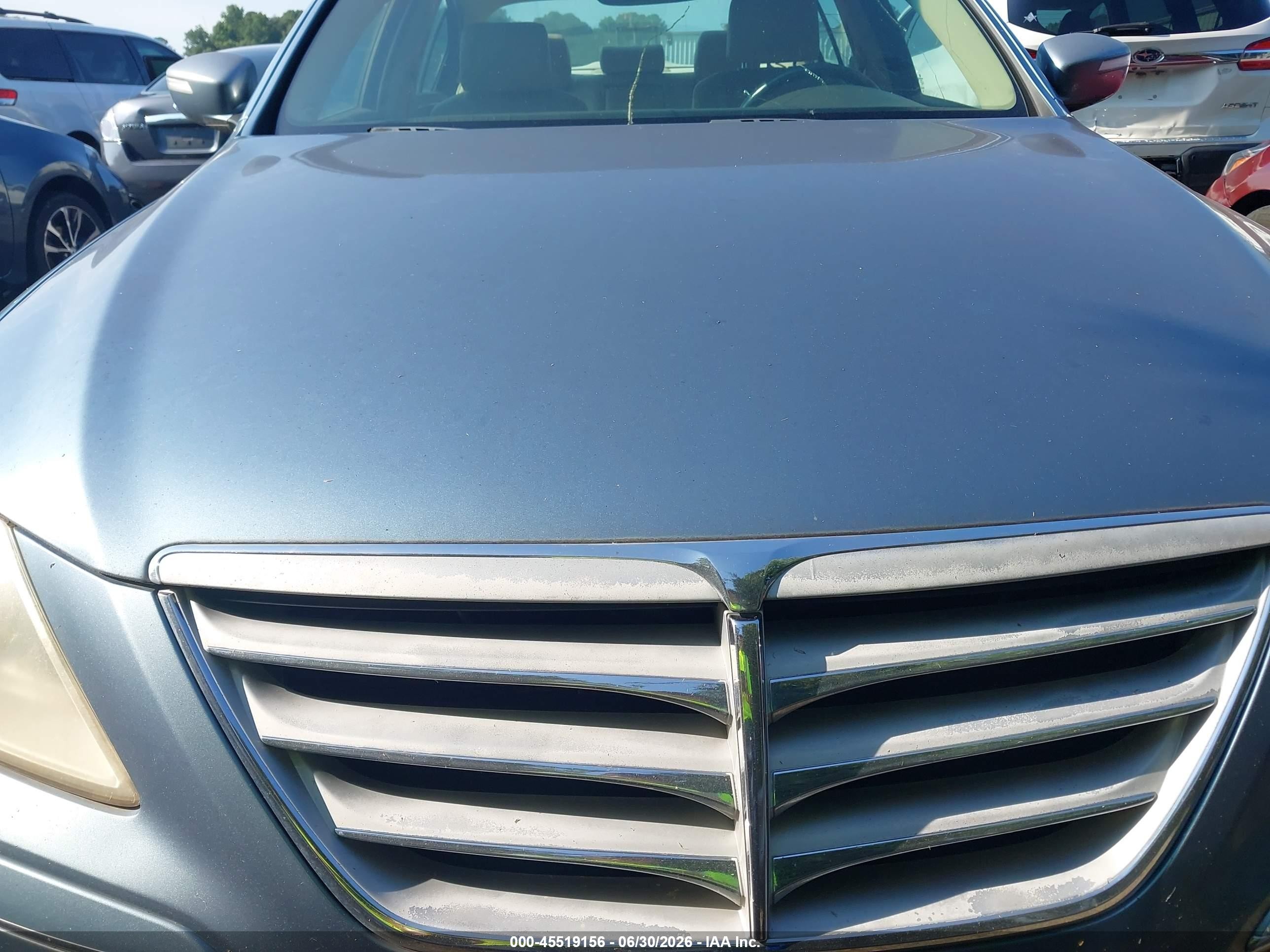 2009 Hyundai Genesis 3.8 Tan vin: KMHGC46E59U024456
